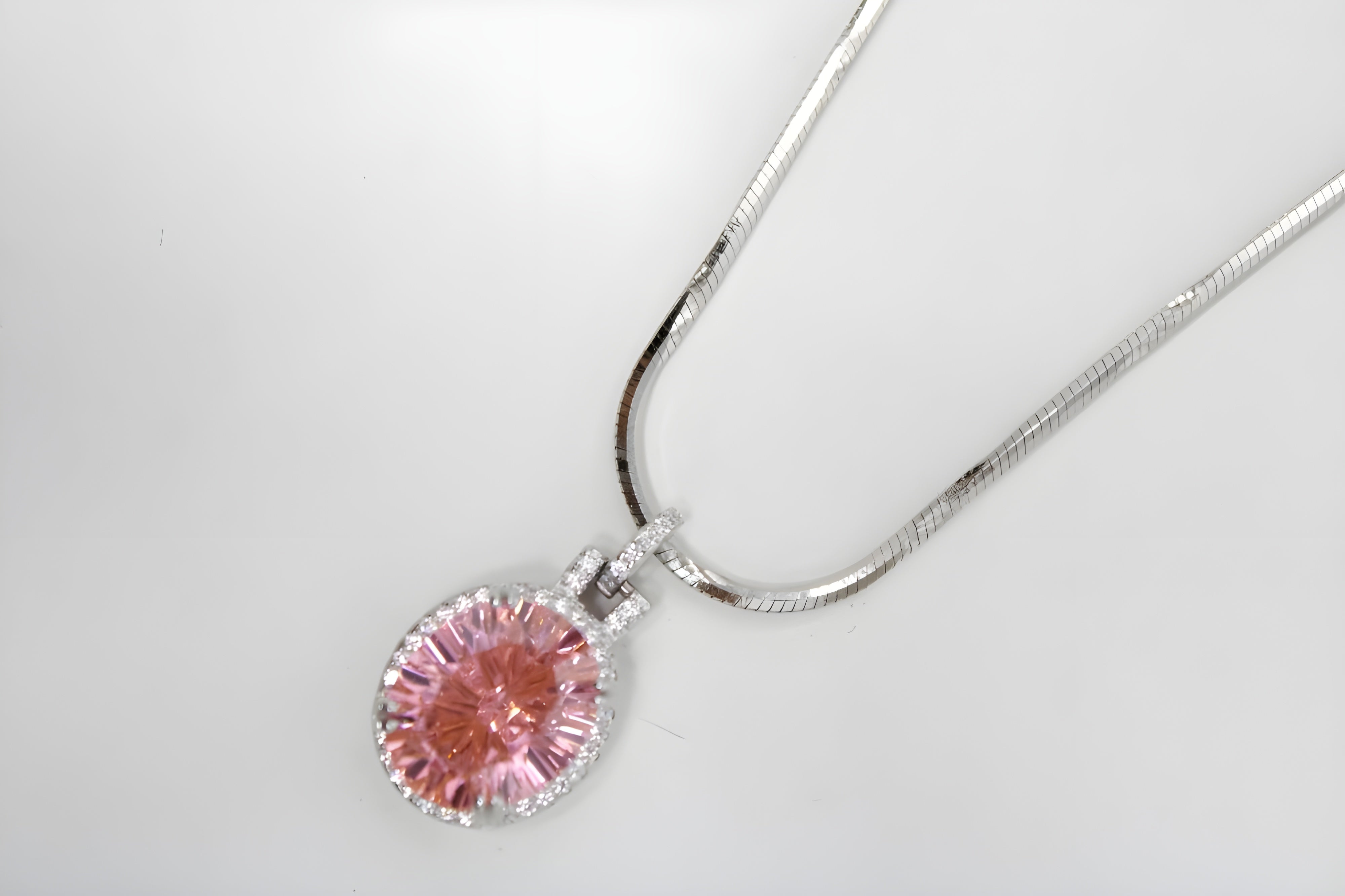 Elegance Pink Oval Halo Pendant in Sterling Silver