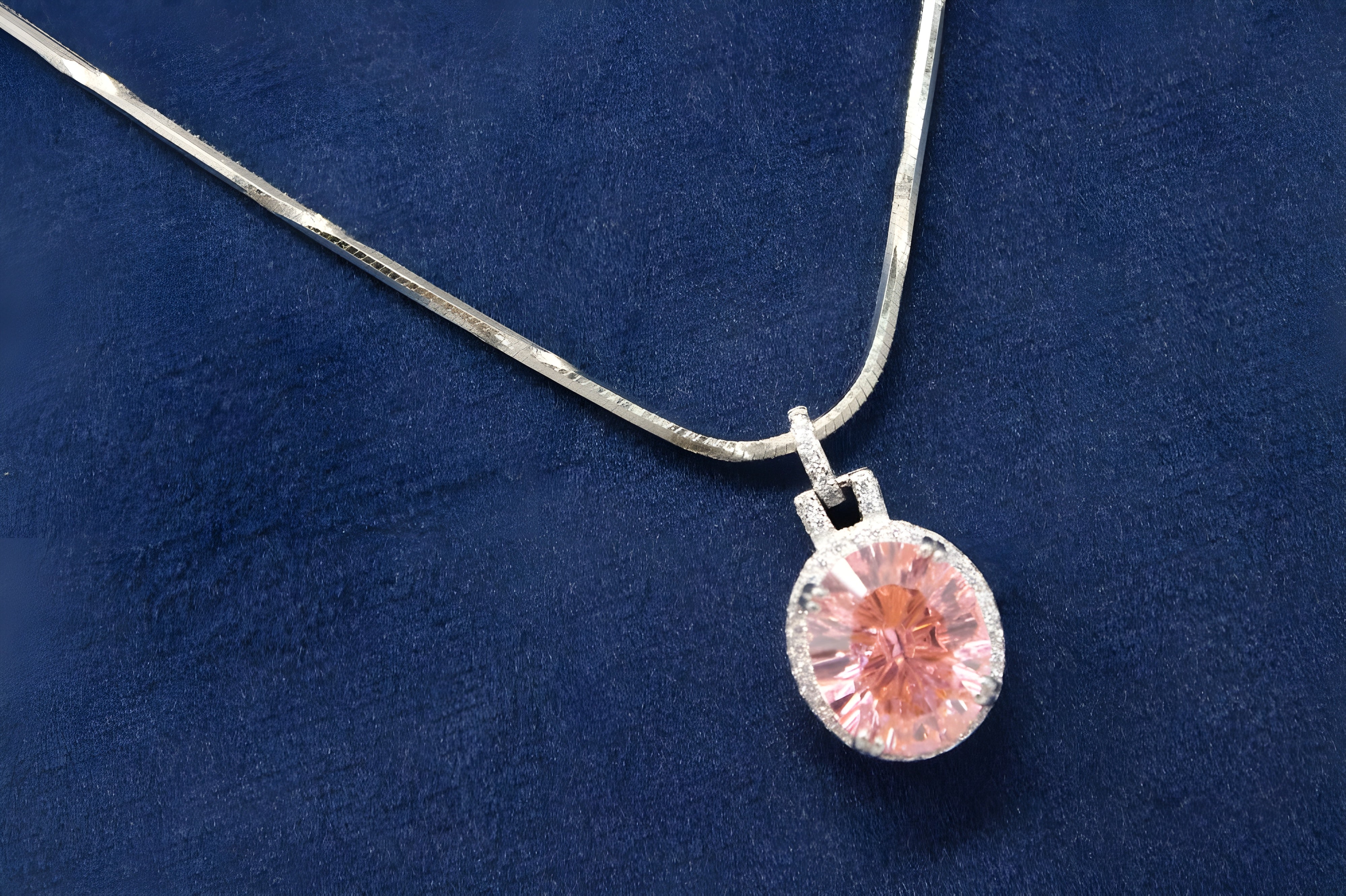 Elegance Pink Oval Halo Pendant in Sterling Silver