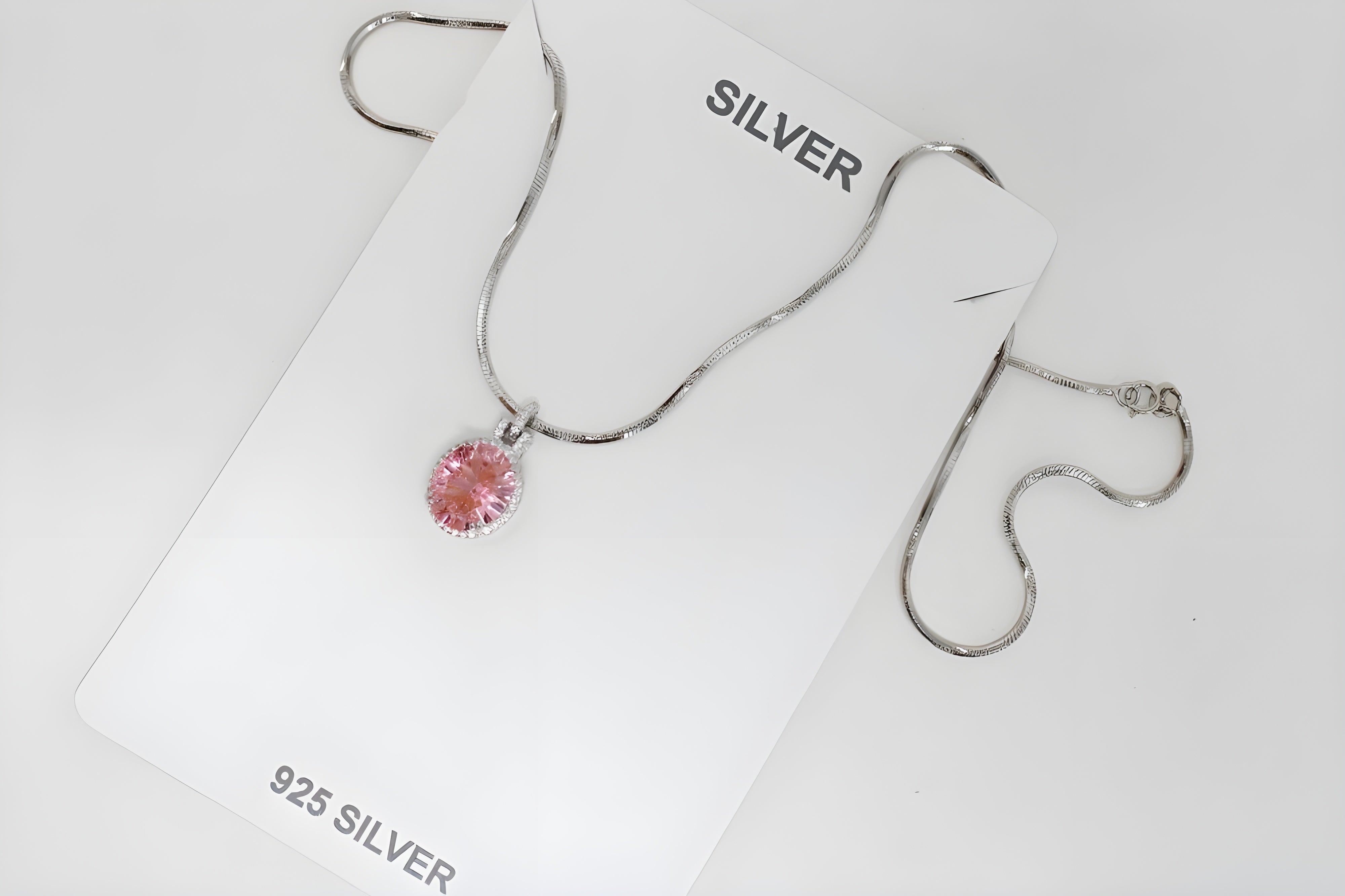 Elegance Pink Oval Halo Pendant in Sterling Silver