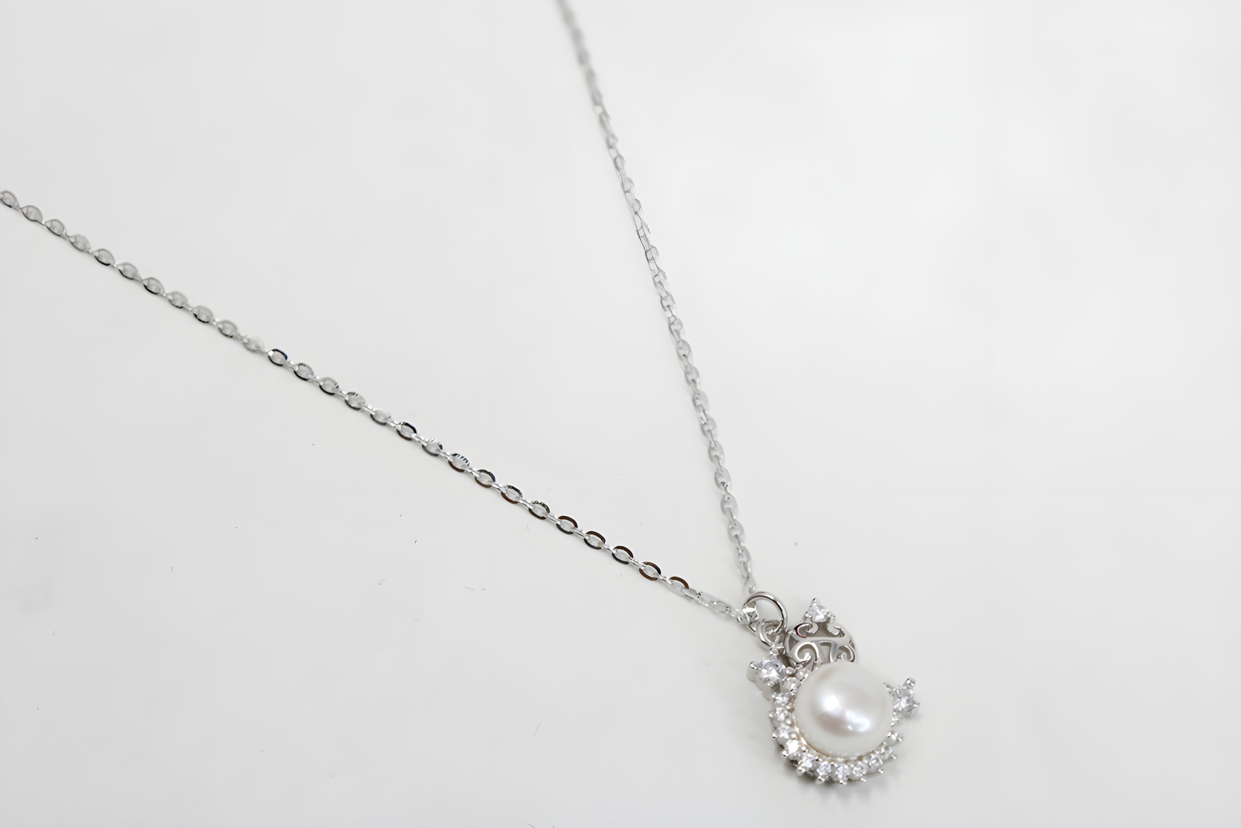 Pearl Adorned Circular Pendant with VeeLux Premium Crystal