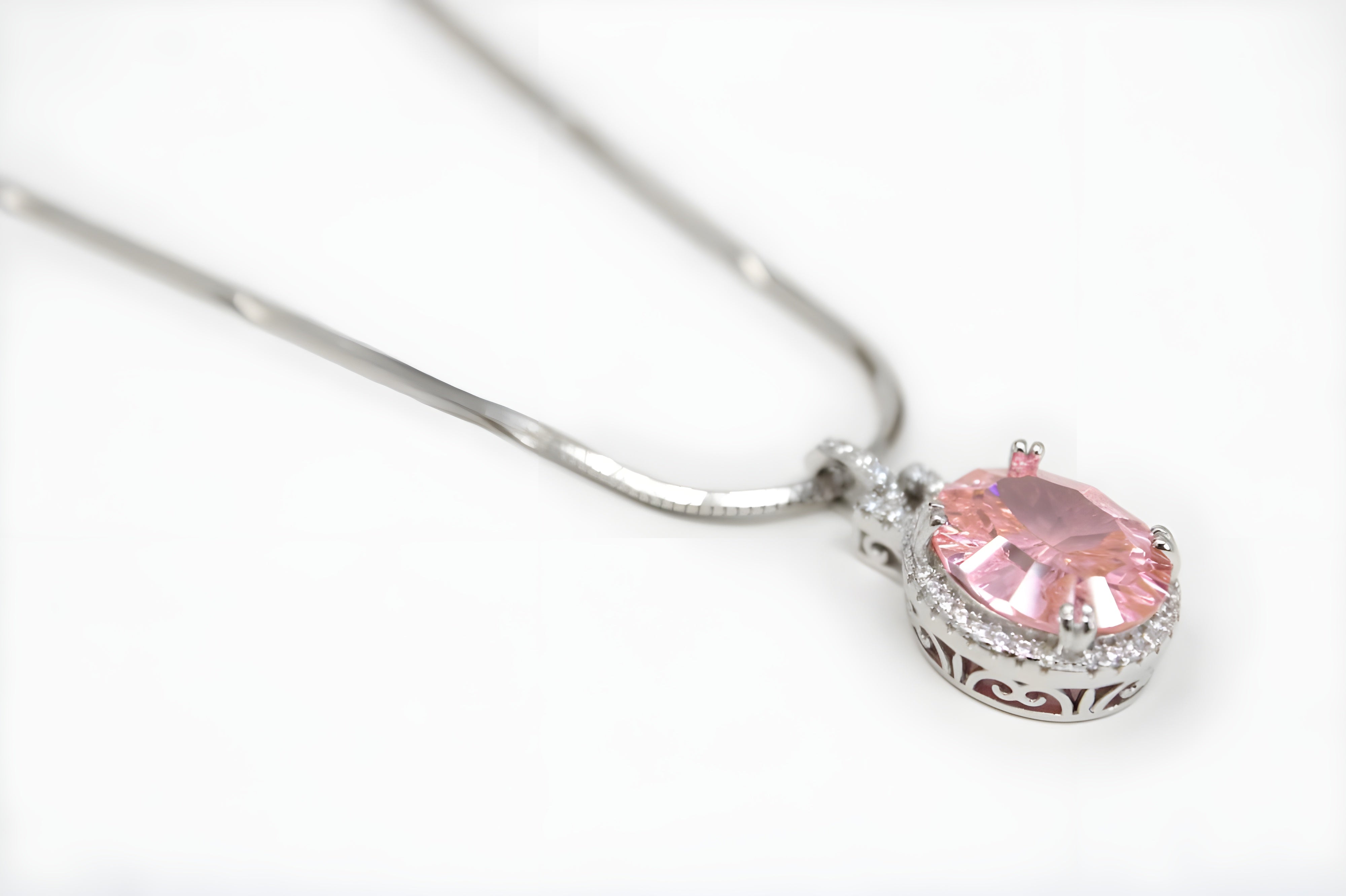 Elegance Pink Oval Halo Pendant in Sterling Silver