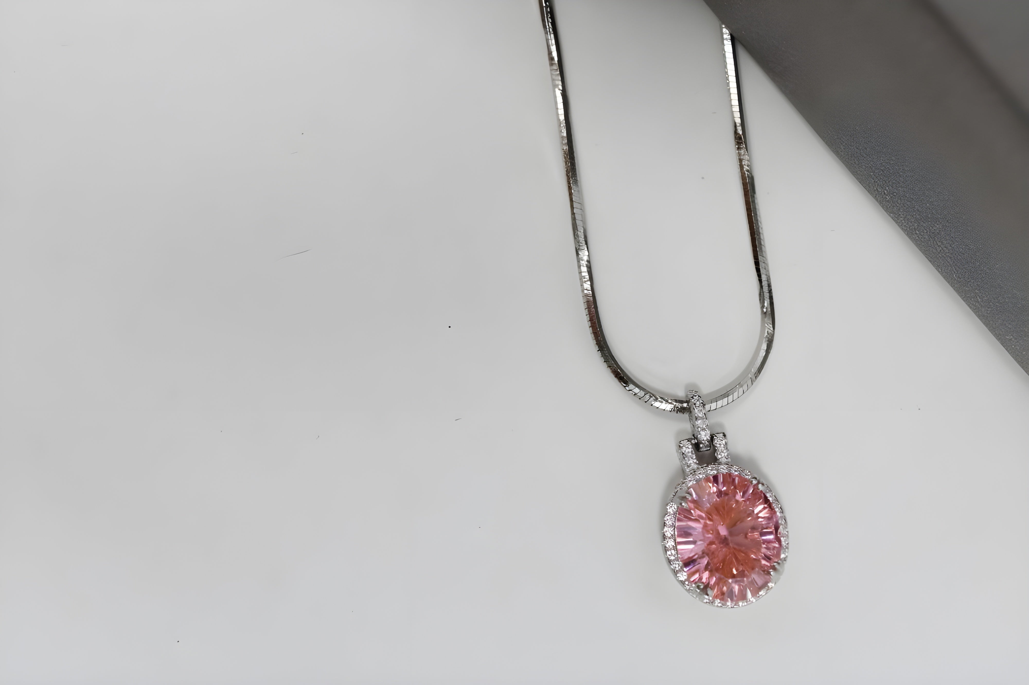 Elegance Pink Oval Halo Pendant in Sterling Silver