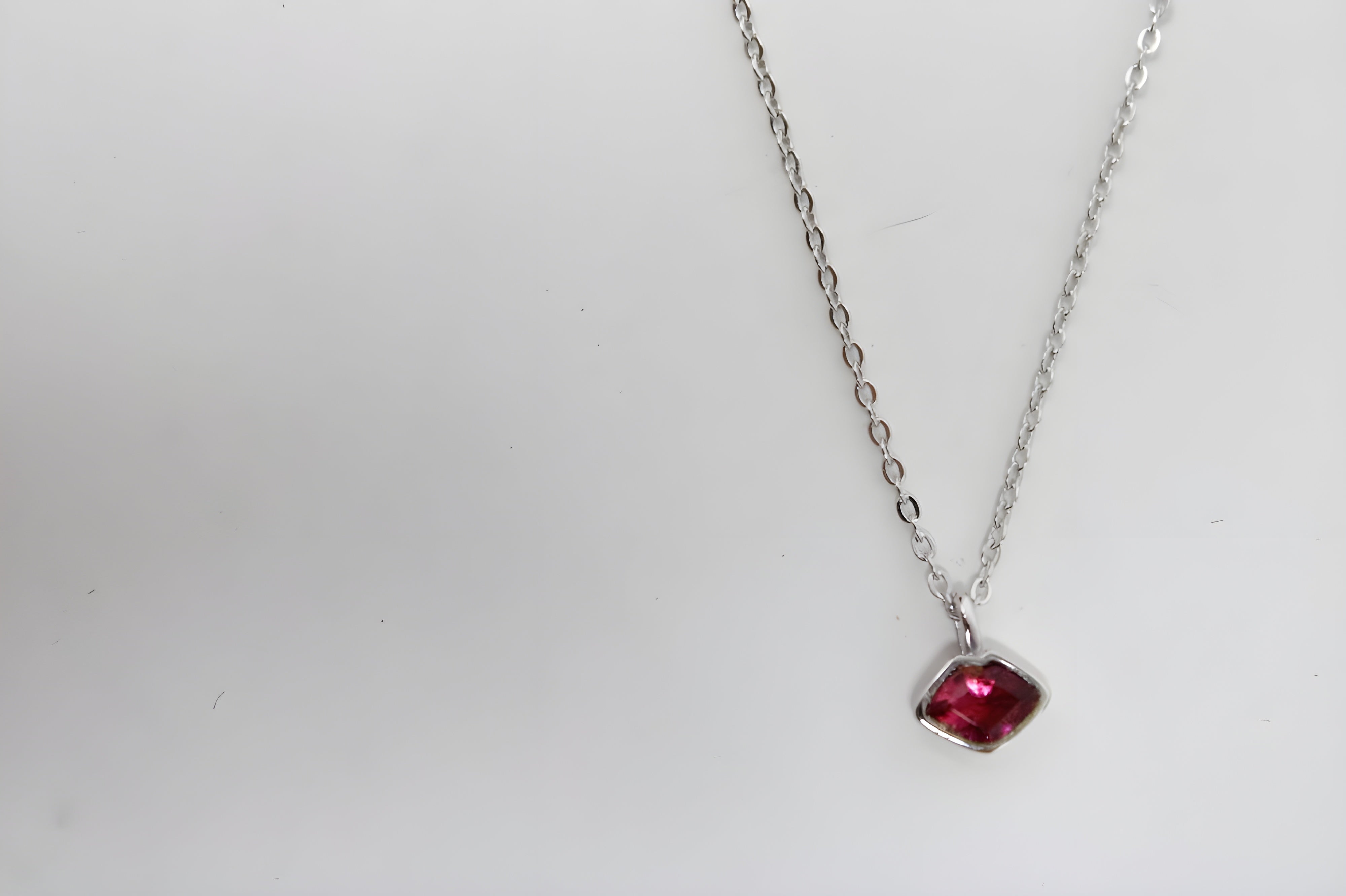 Elegant Ruby VeeLux Crystal Pendant in Sterling Silver