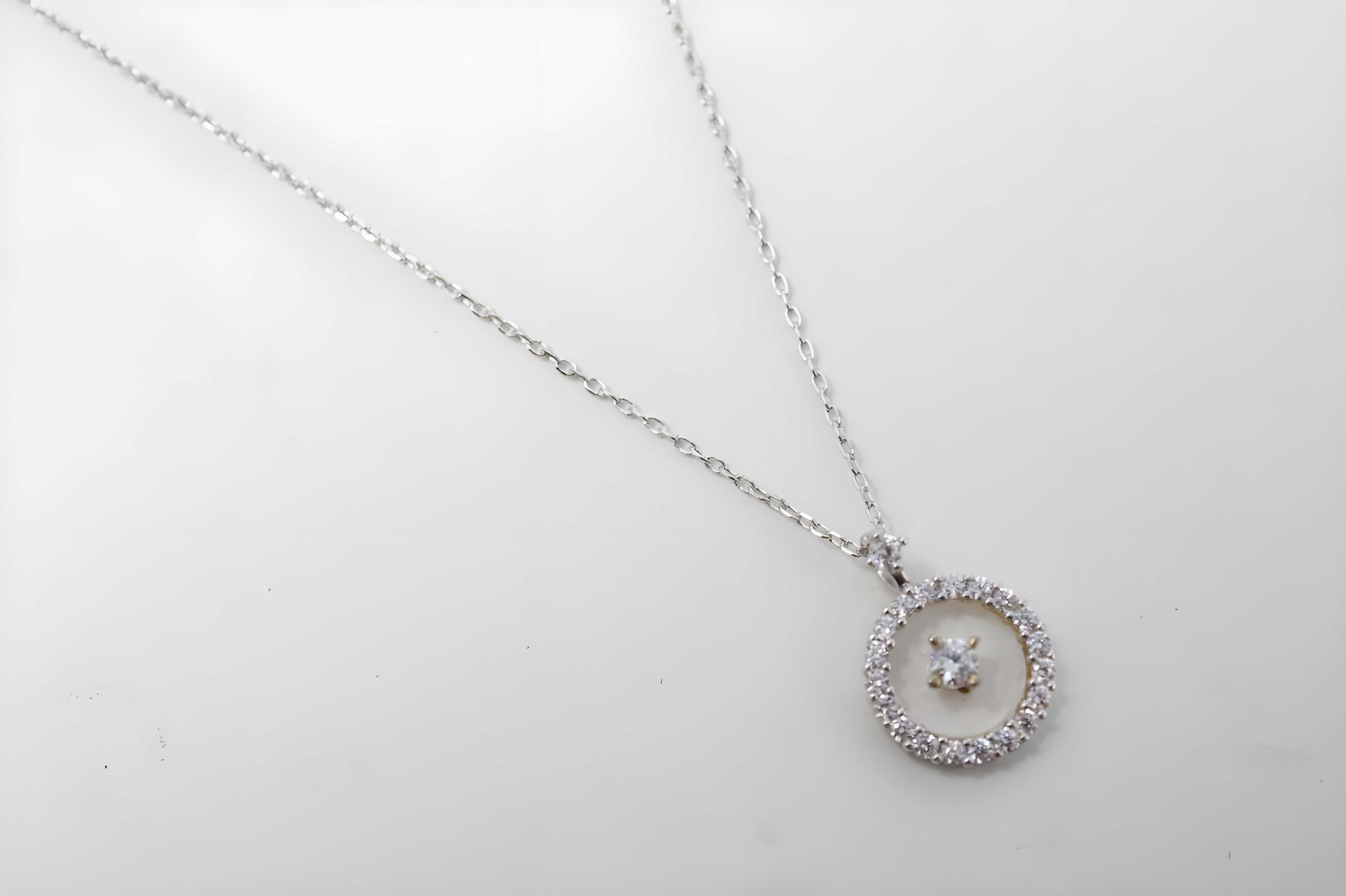 Radiant Halo Crystal Circle Pendant by VeeLux