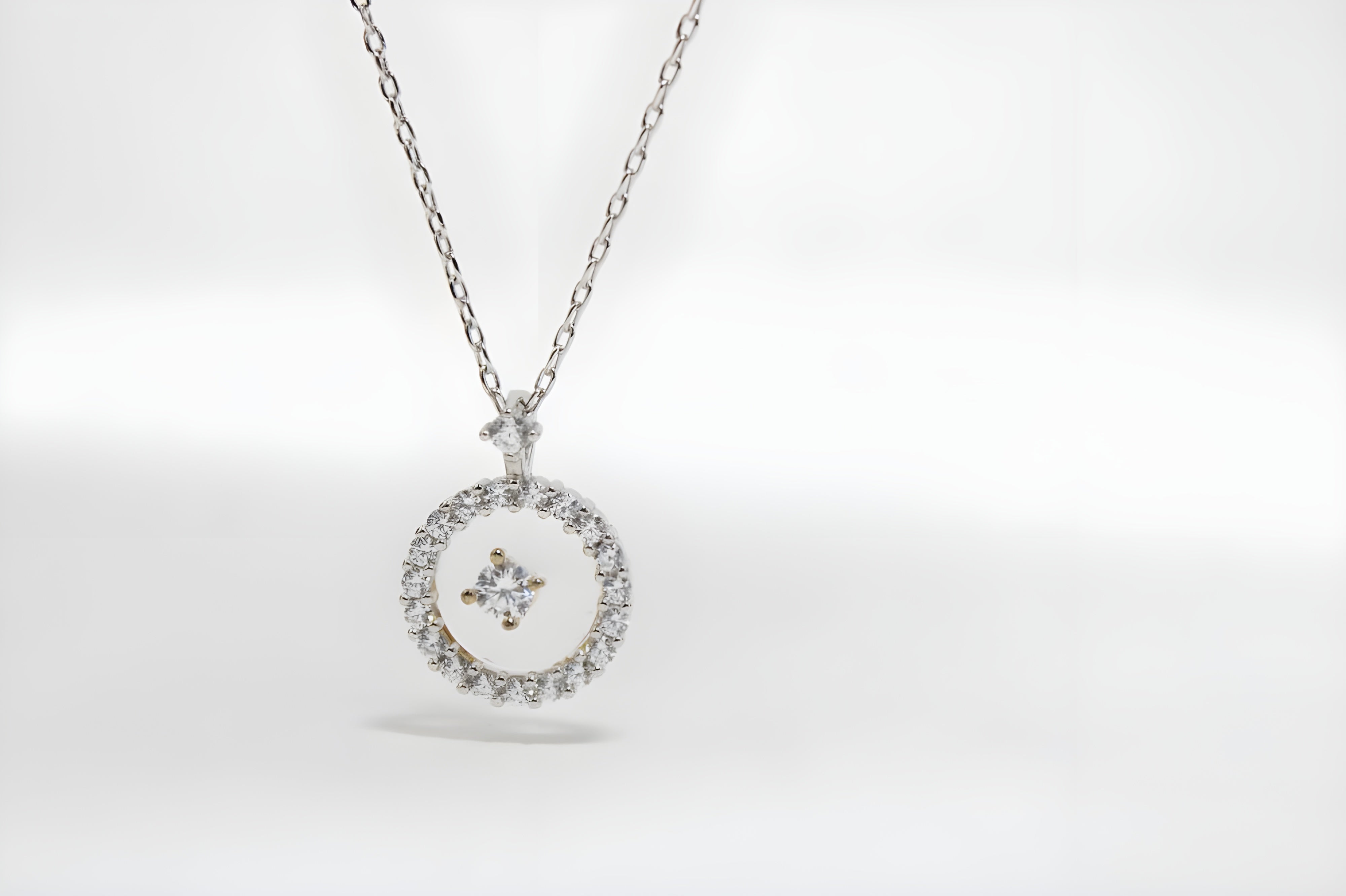 Radiant Halo Crystal Circle Pendant by VeeLux