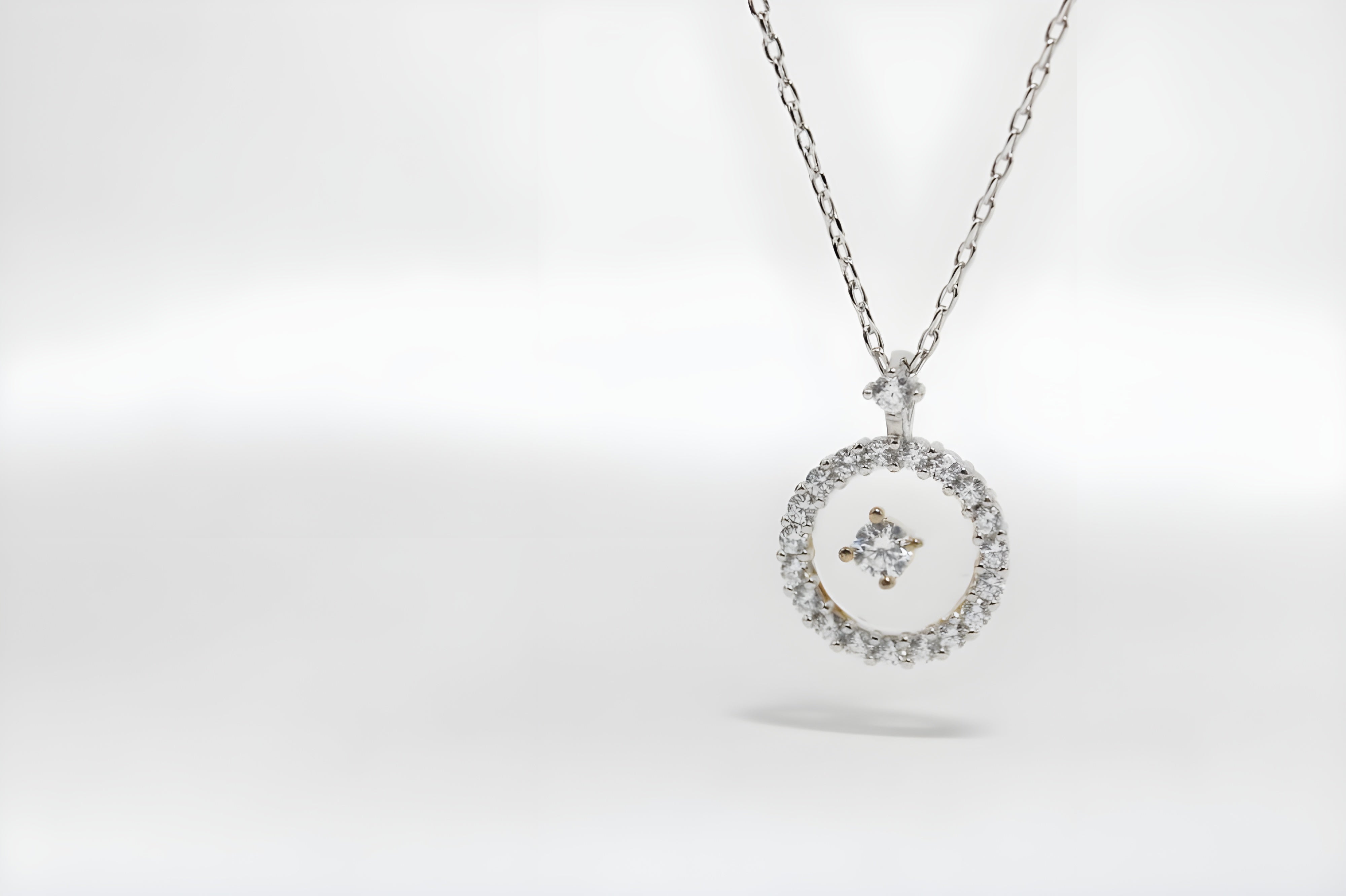 Radiant Halo Crystal Circle Pendant by VeeLux