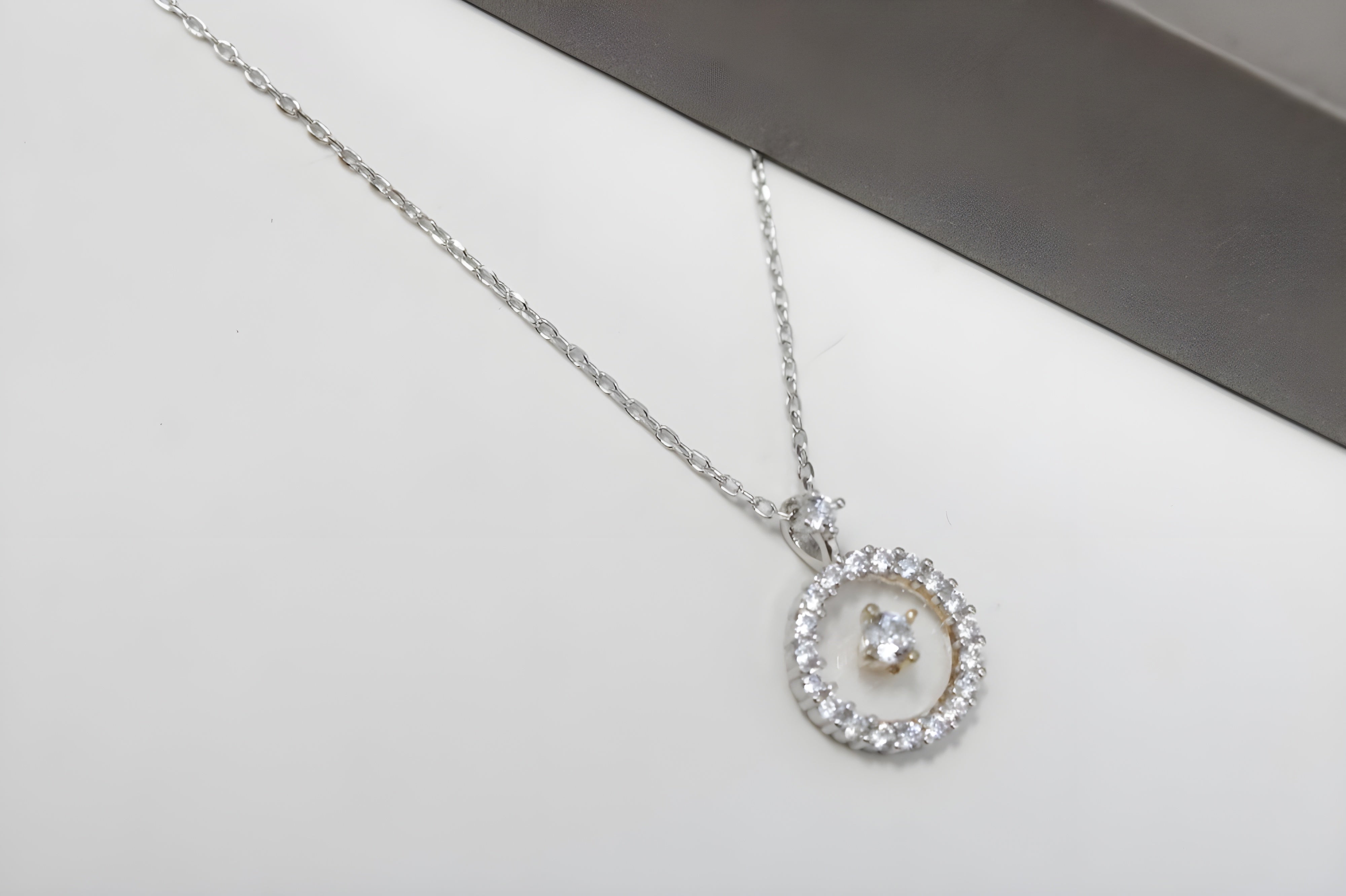 Radiant Halo Crystal Circle Pendant by VeeLux