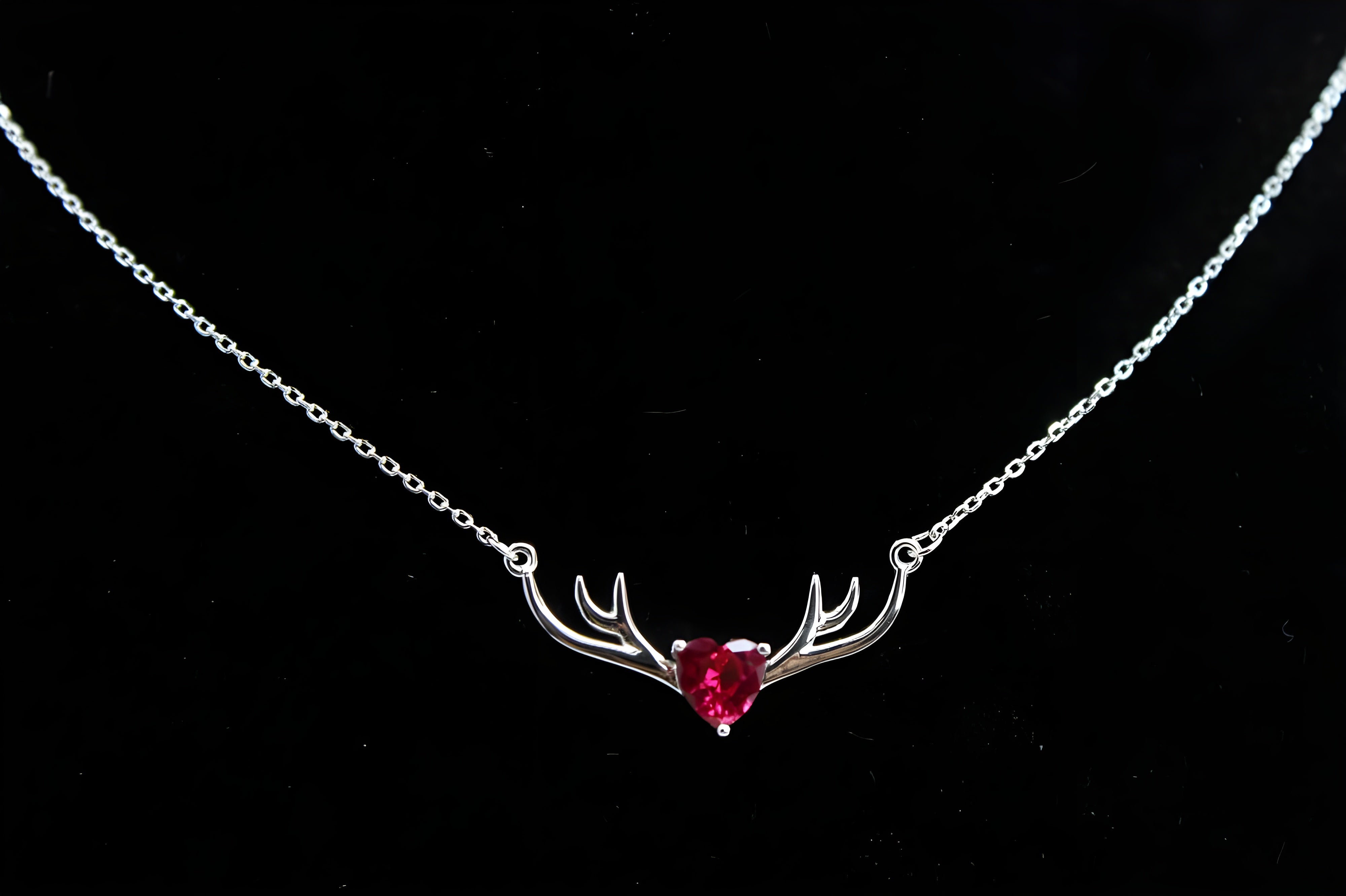 VeeLux Crystal Heart Pendant Nestled Between Sterling Silver Antlers