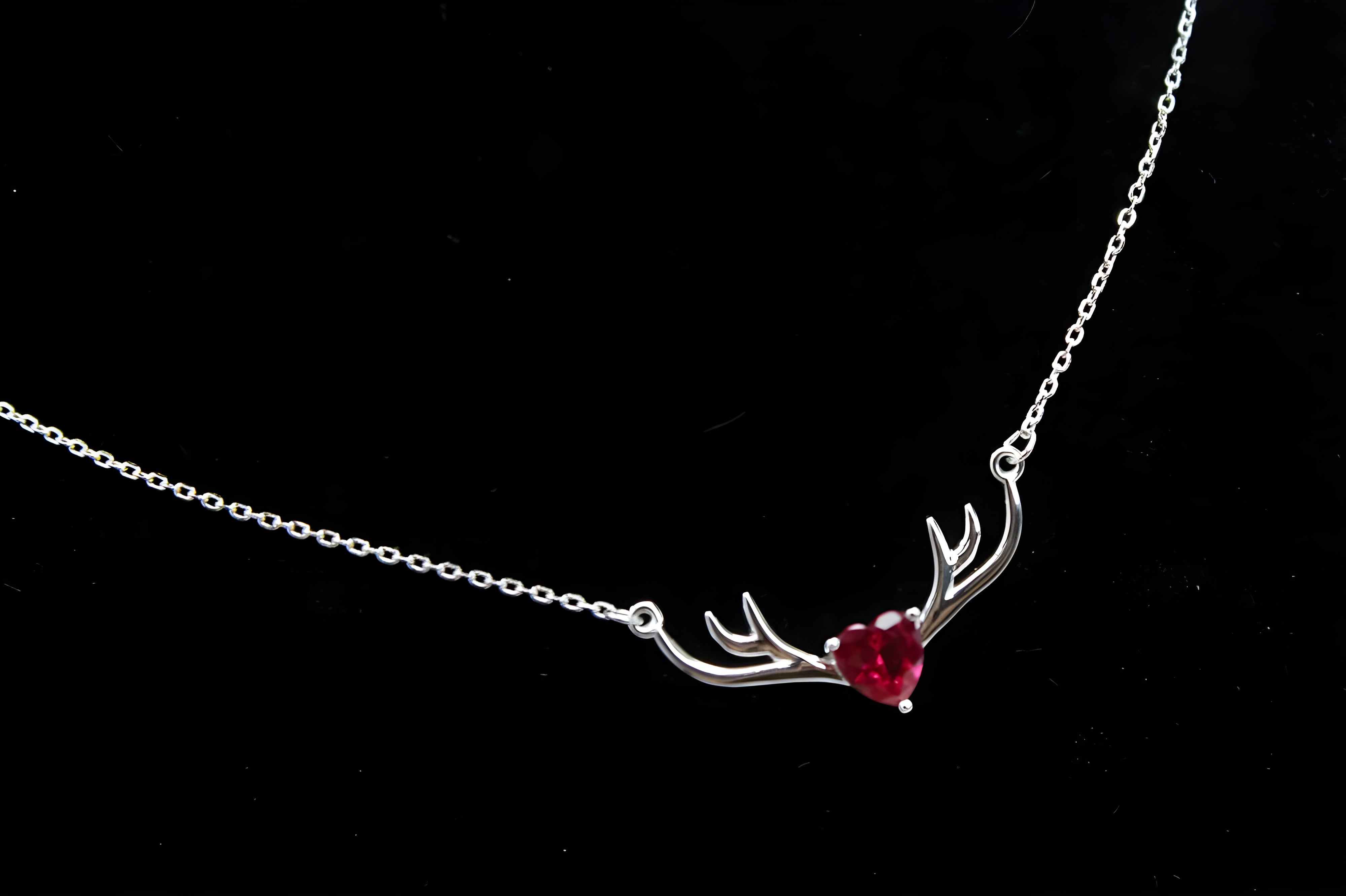 VeeLux Crystal Heart Pendant Nestled Between Sterling Silver Antlers