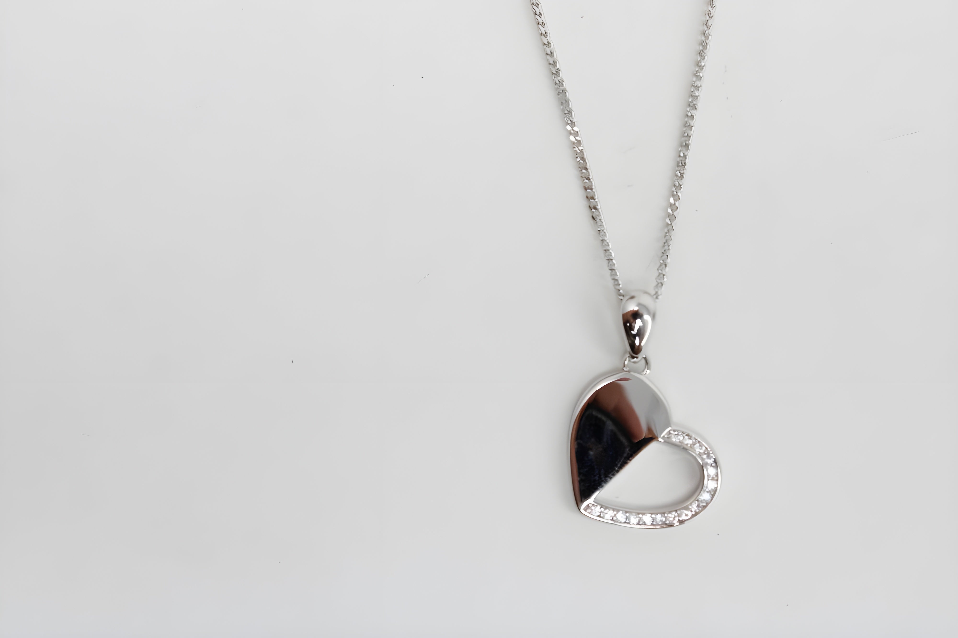 Polished Half Heart Pendant Adorned with VeeLux Crystals