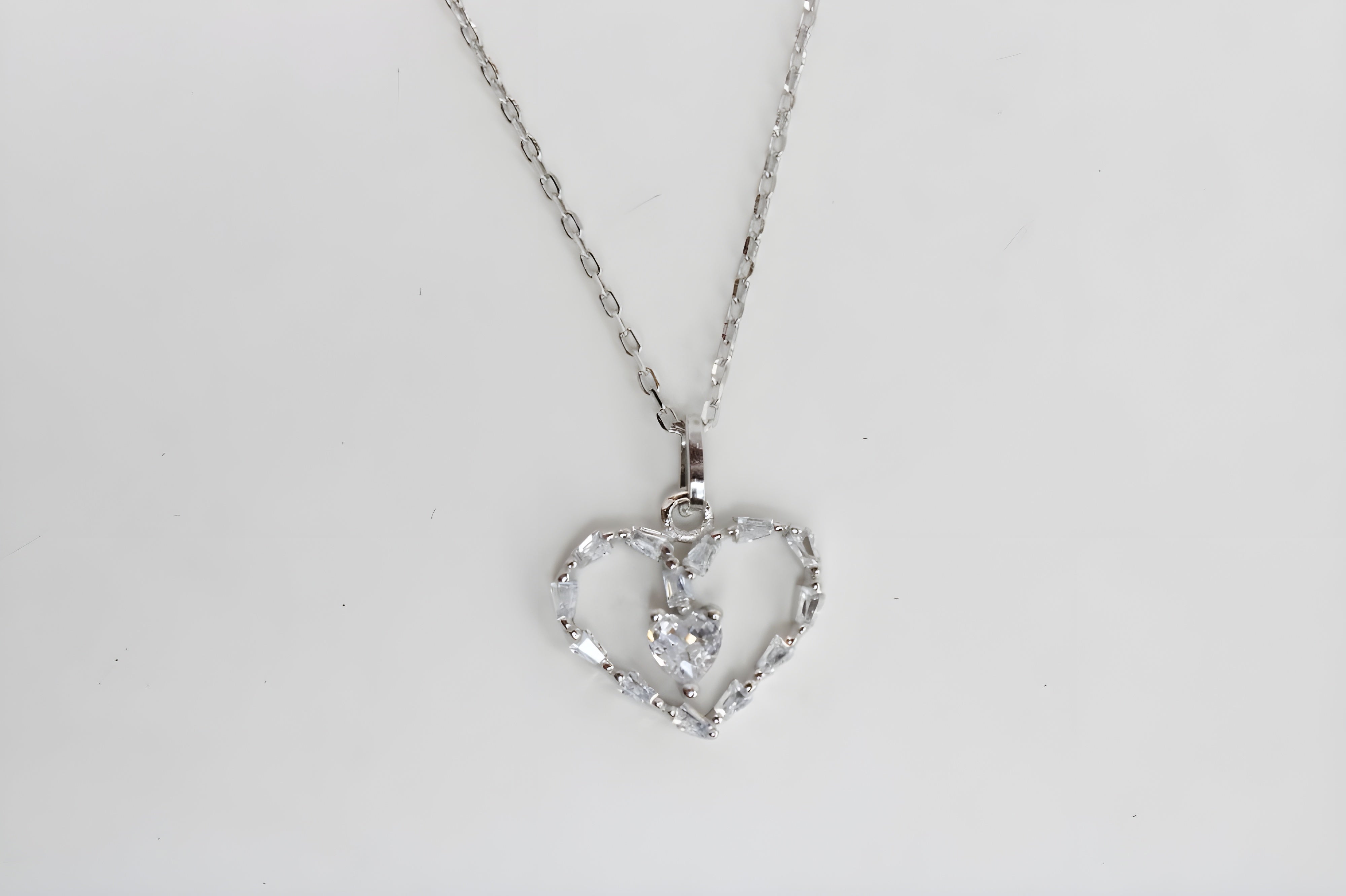 Radiant Heart's Embrace Pendant with Baguette and Heart VeeLux Crystals