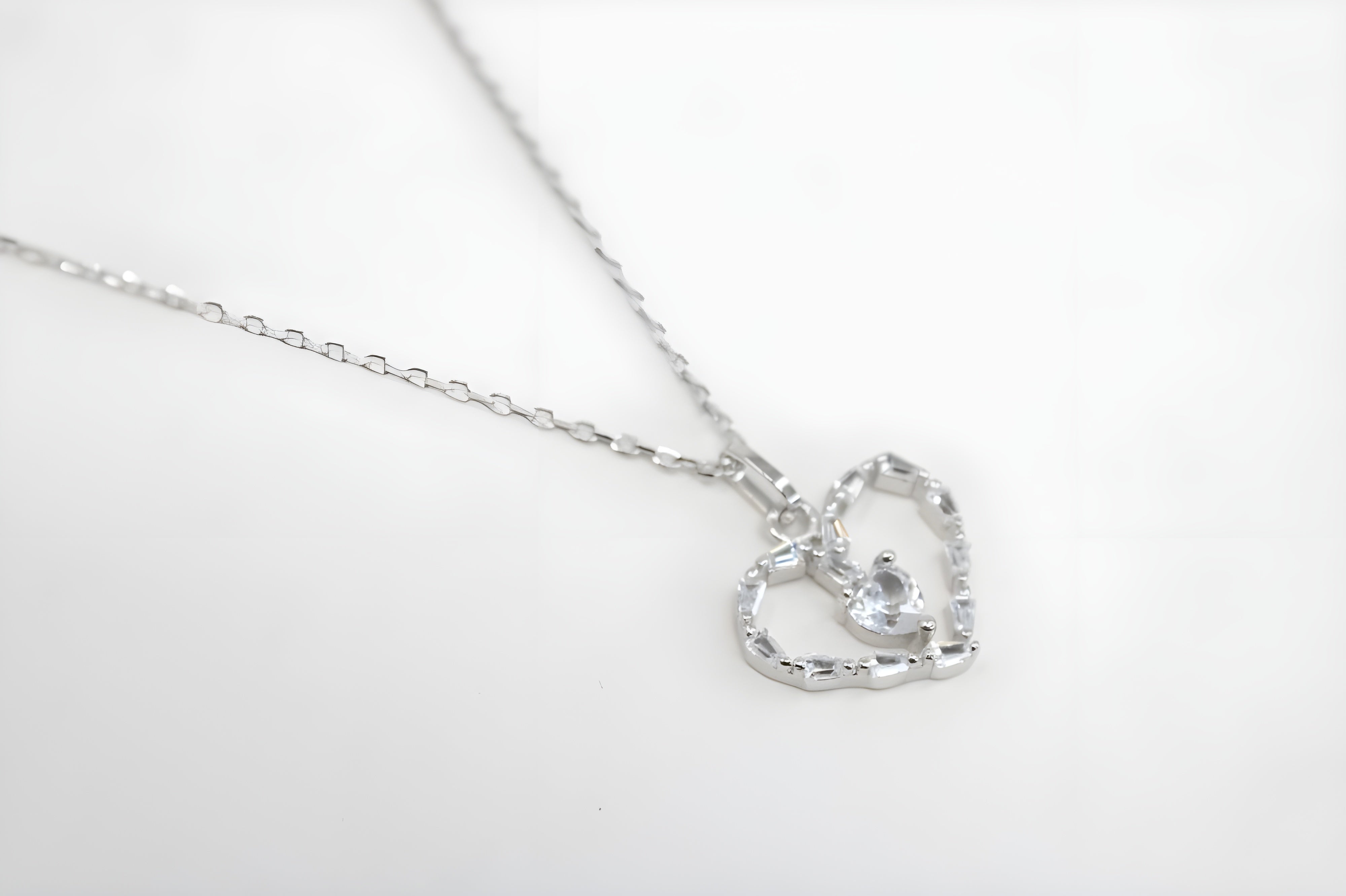 Radiant Heart's Embrace Pendant with Baguette and Heart VeeLux Crystals