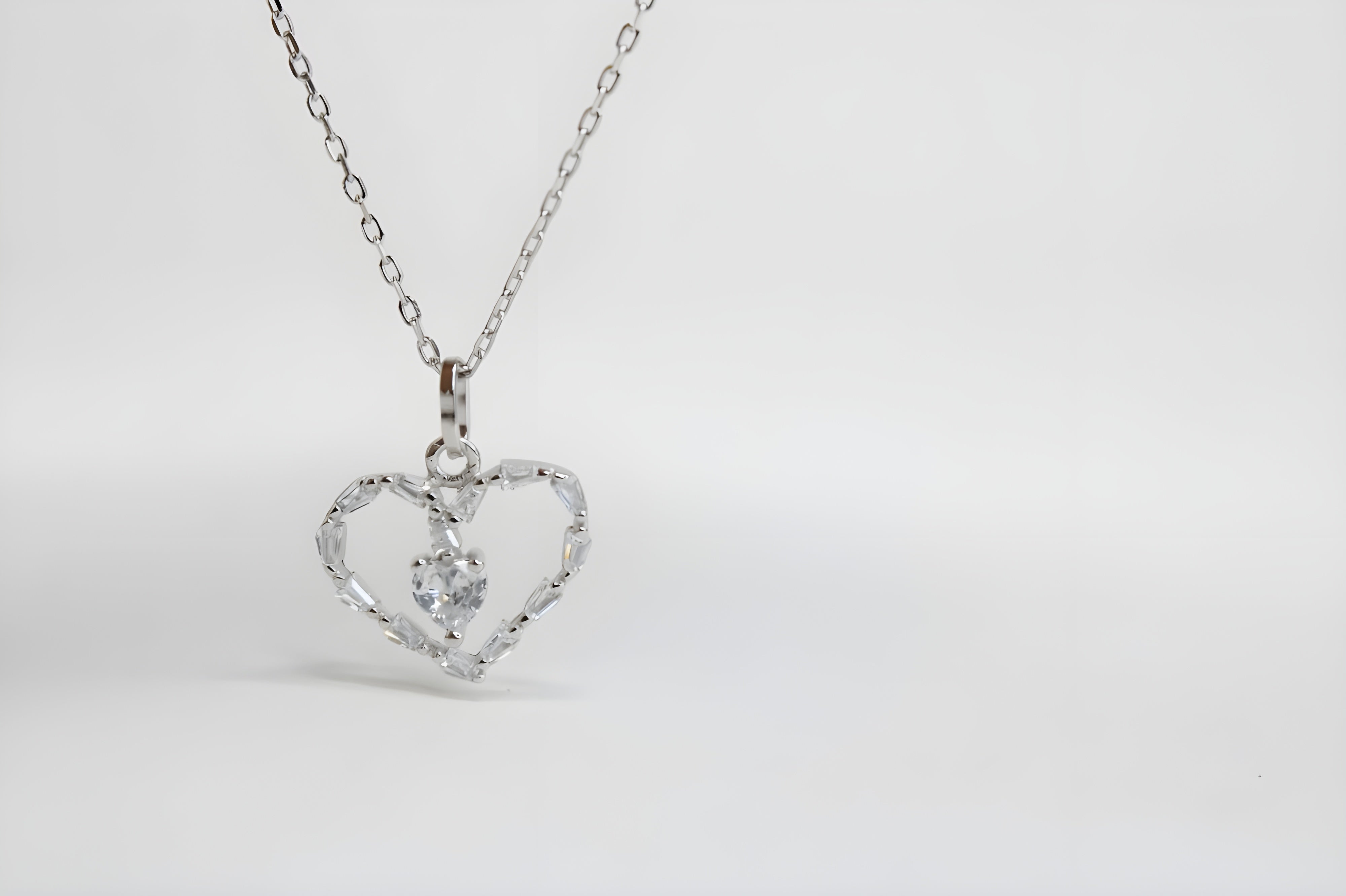 Radiant Heart's Embrace Pendant with Baguette and Heart VeeLux Crystals