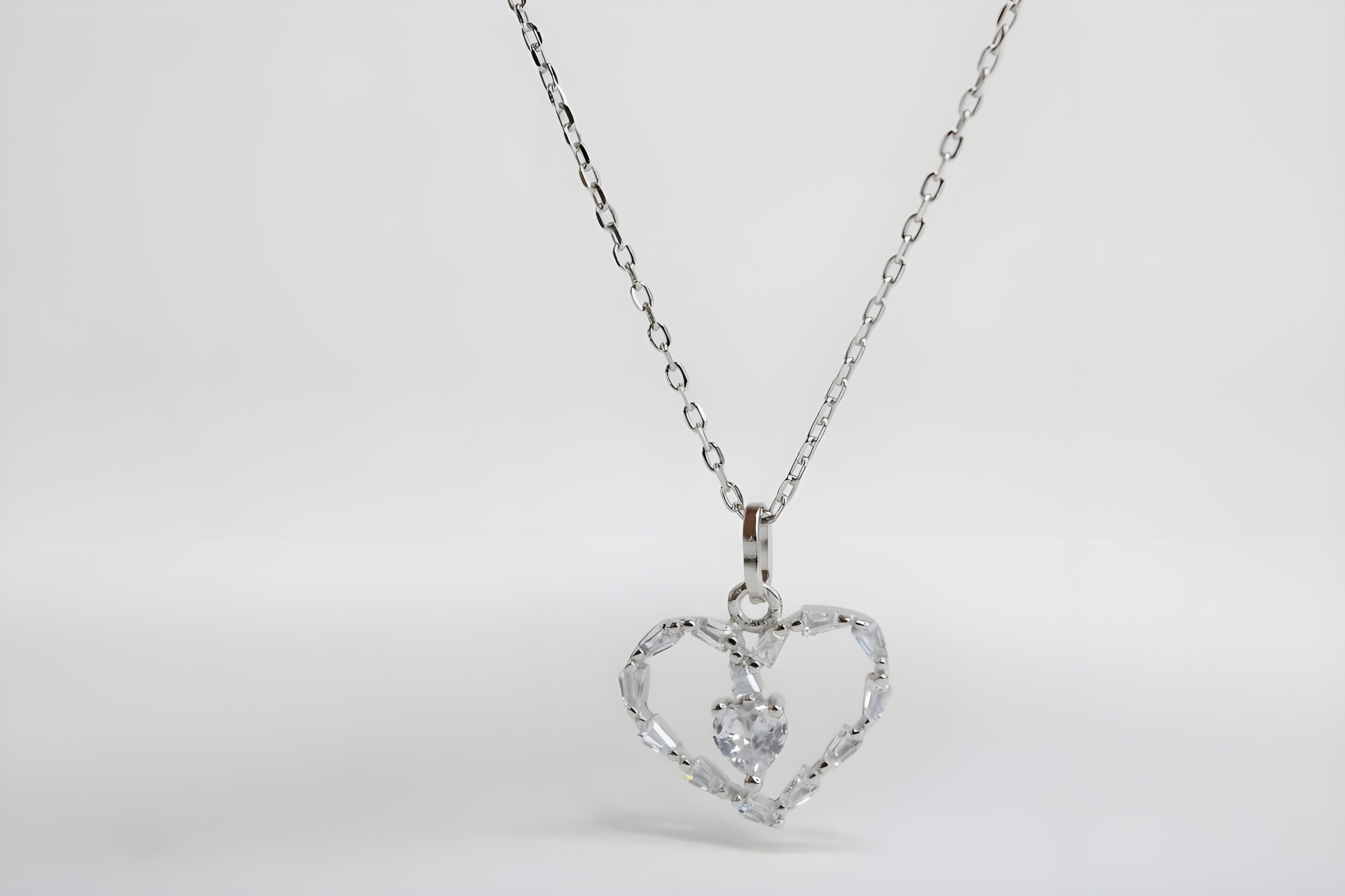 Radiant Heart's Embrace Pendant with Baguette and Heart VeeLux Crystals