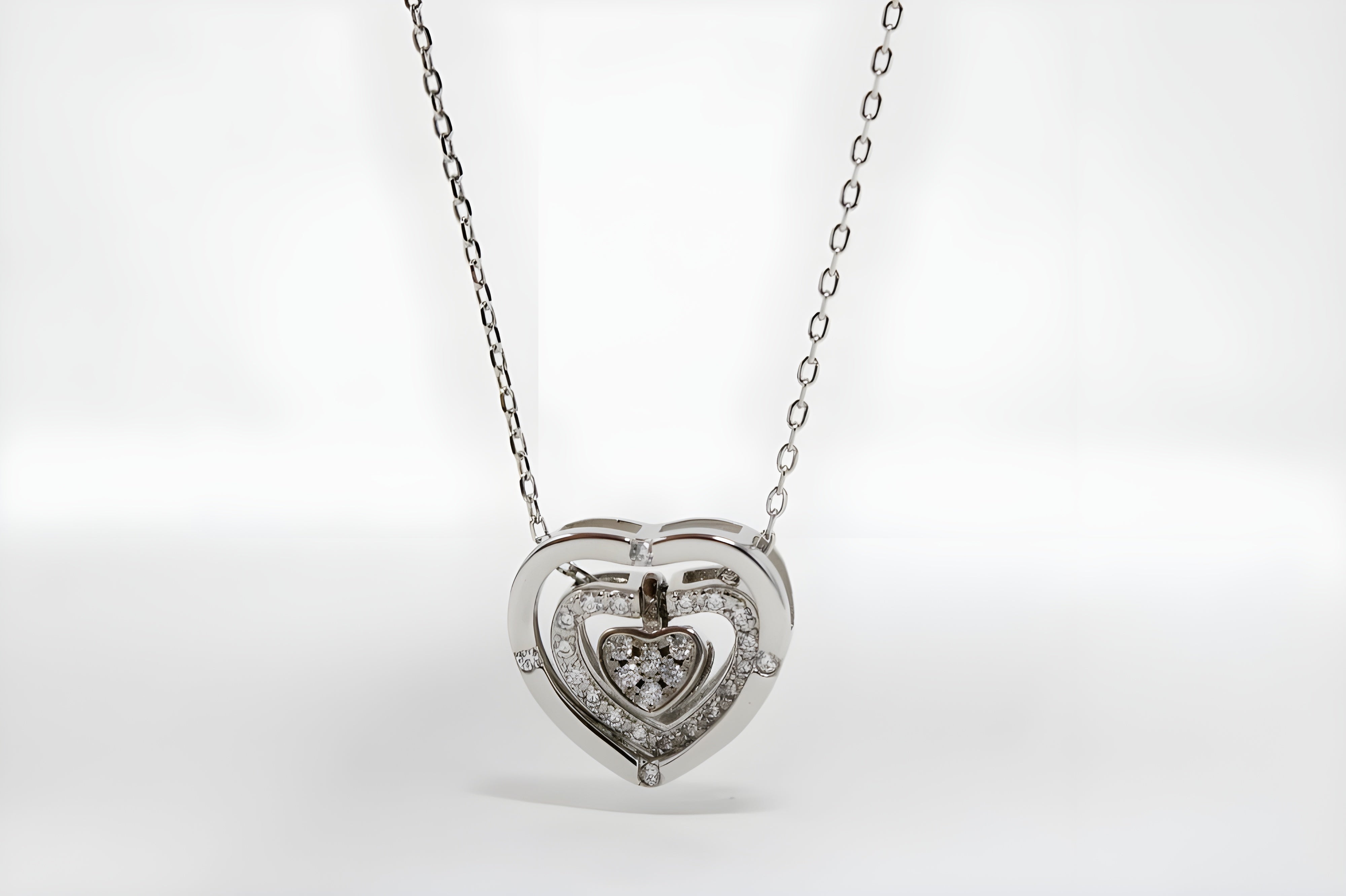 Interlocking Hearts Pendant in Premium Silver and Crystals