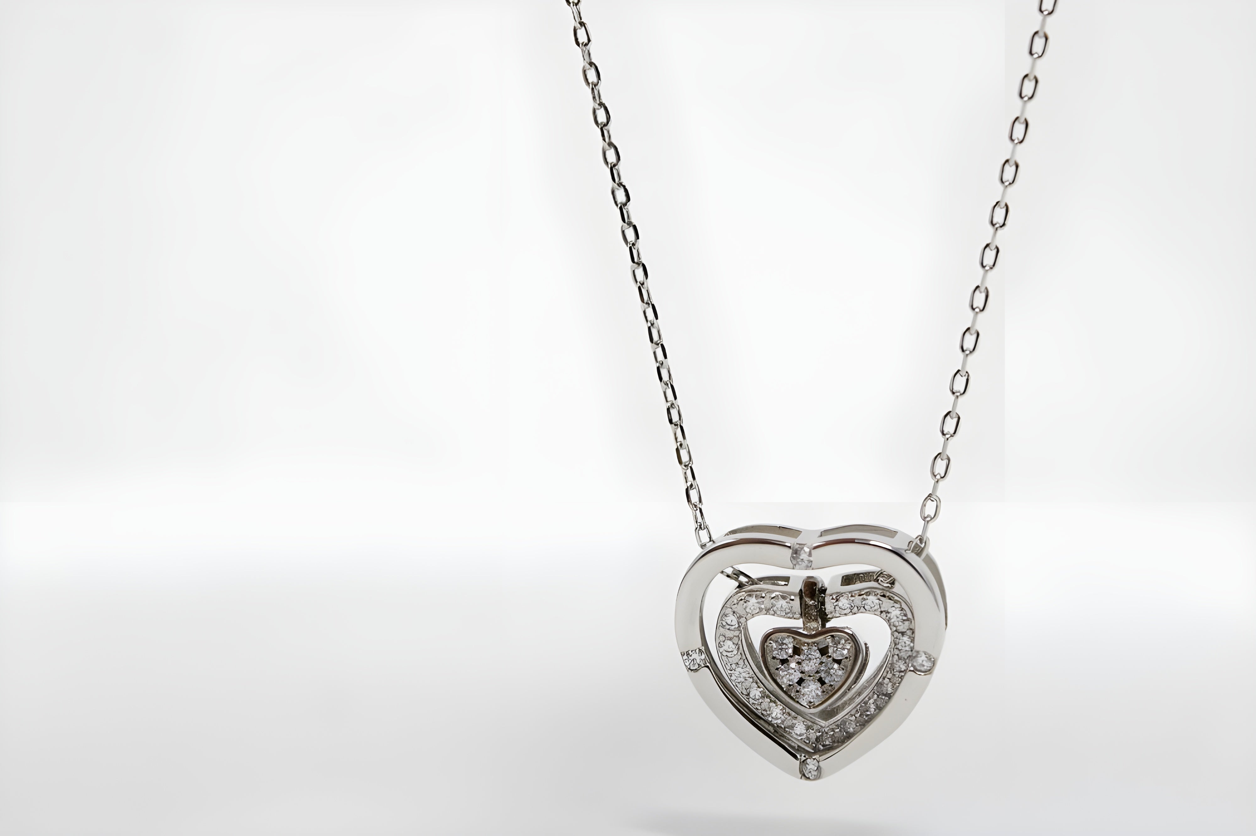 Interlocking Hearts Pendant in Premium Silver and Crystals