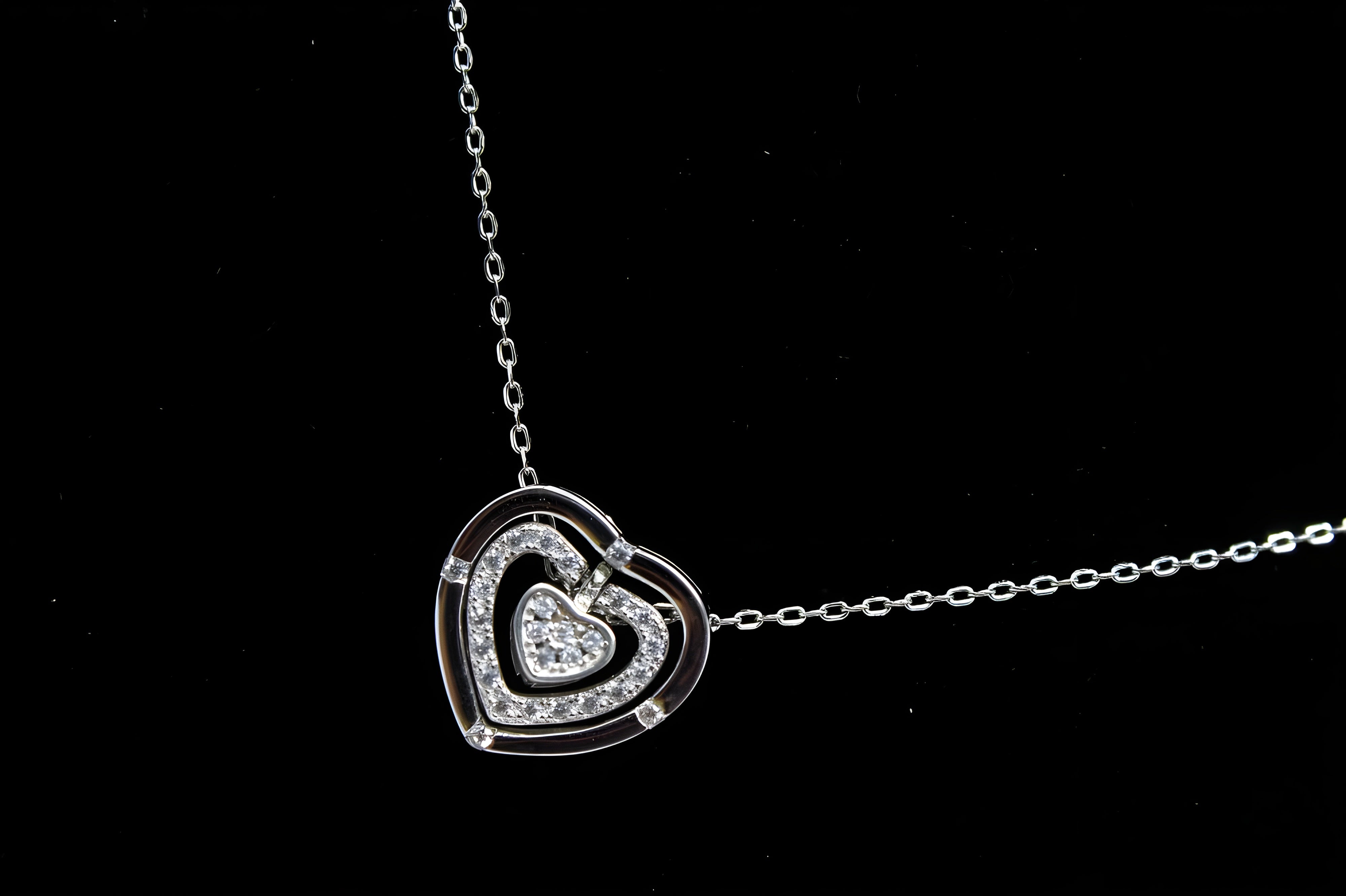 Interlocking Hearts Pendant in Premium Silver and Crystals