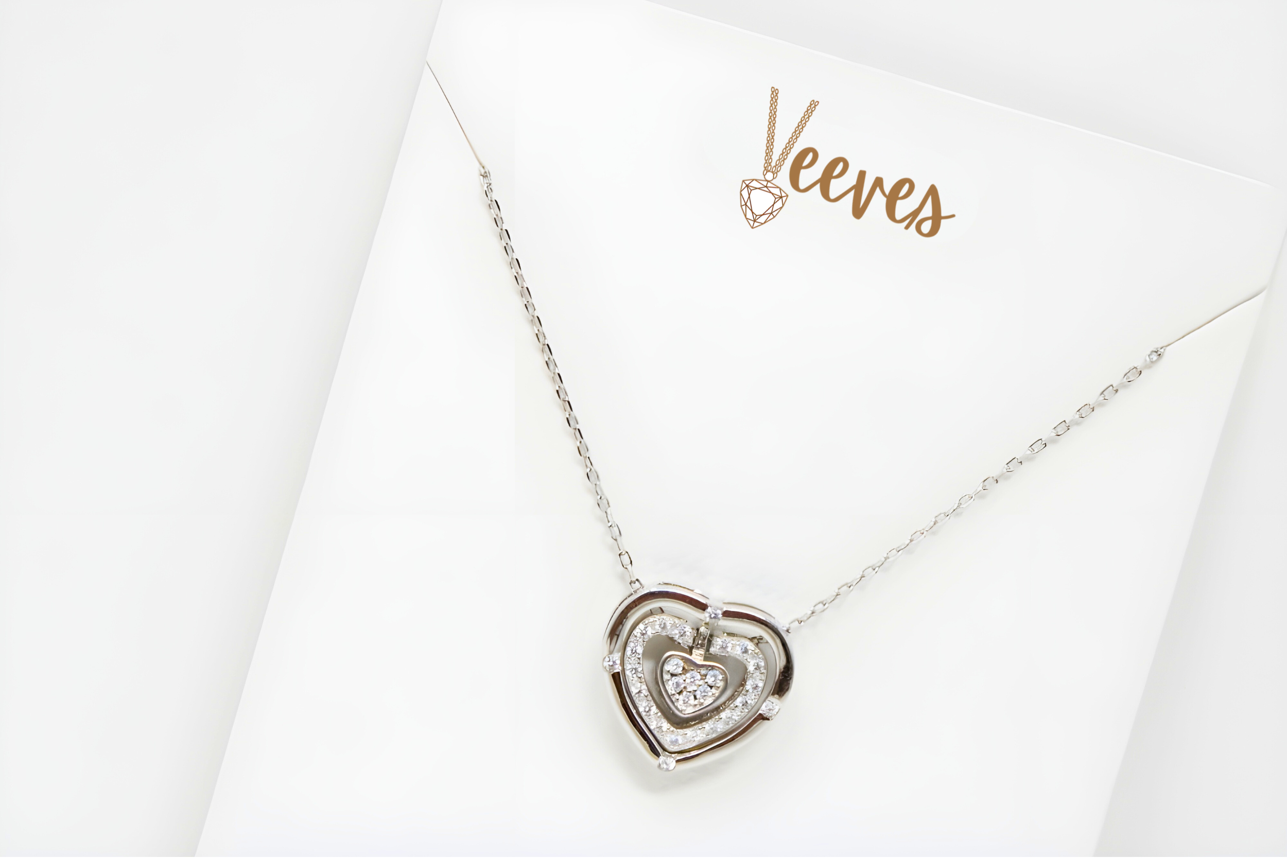 Interlocking Hearts Pendant in Premium Silver and Crystals