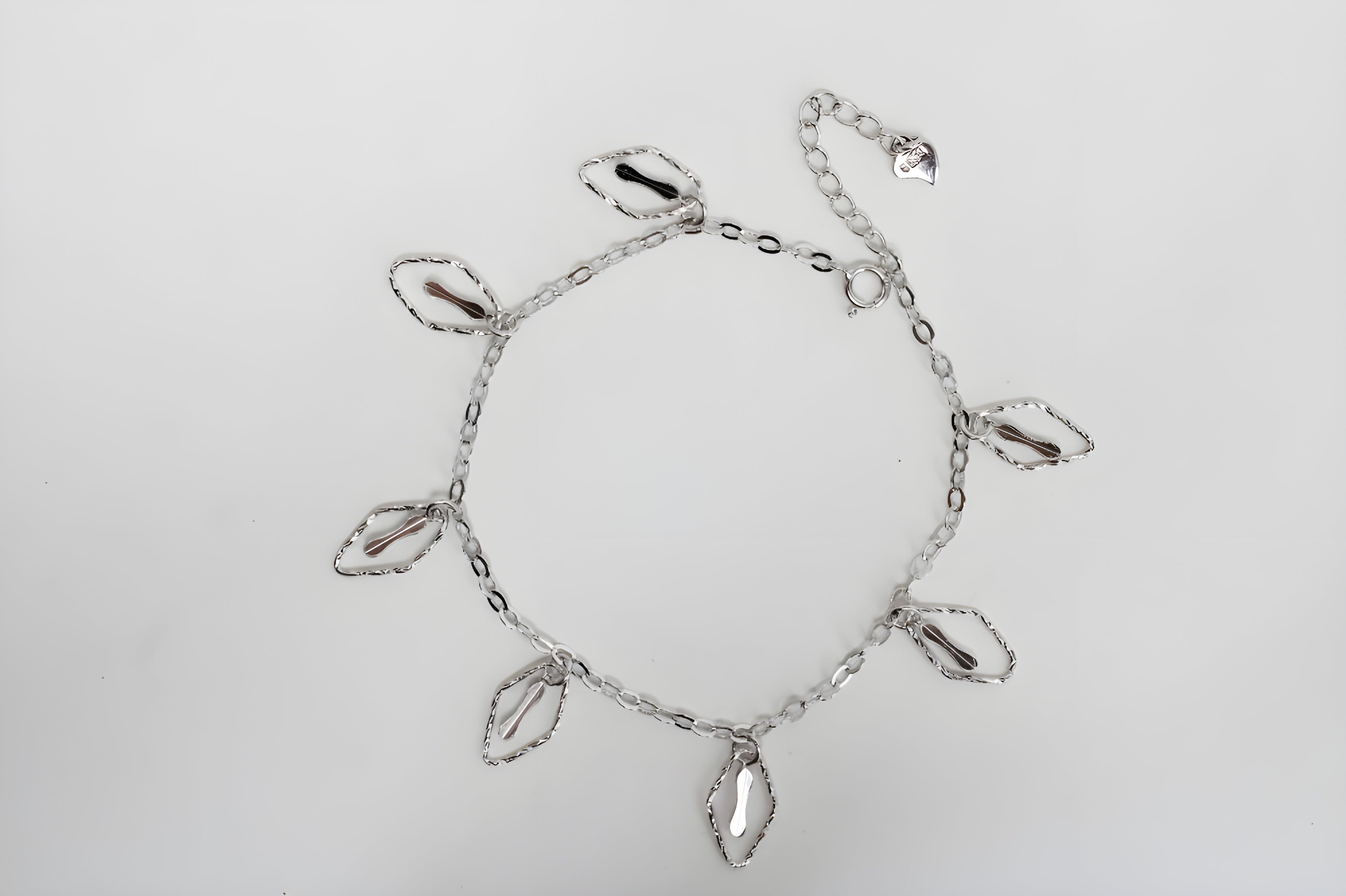 Whispering Leaves Silver Charm Bracelet