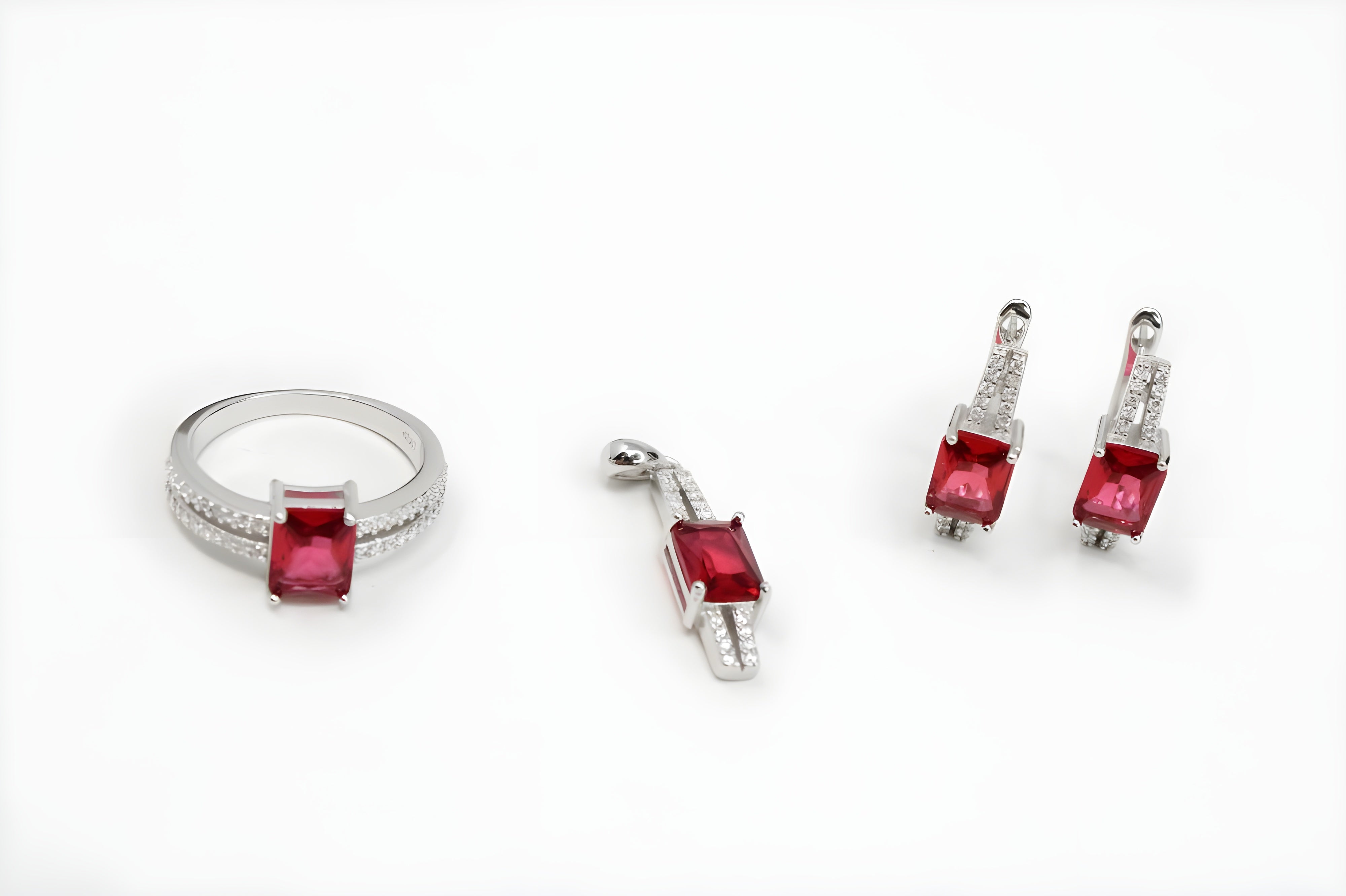 Ruby Radiance Diamond Jewelry Set - Sterling Silver Ring, Pendant & Drop Earrings with Rectangular-Cut Rubies and White Diamond Accents