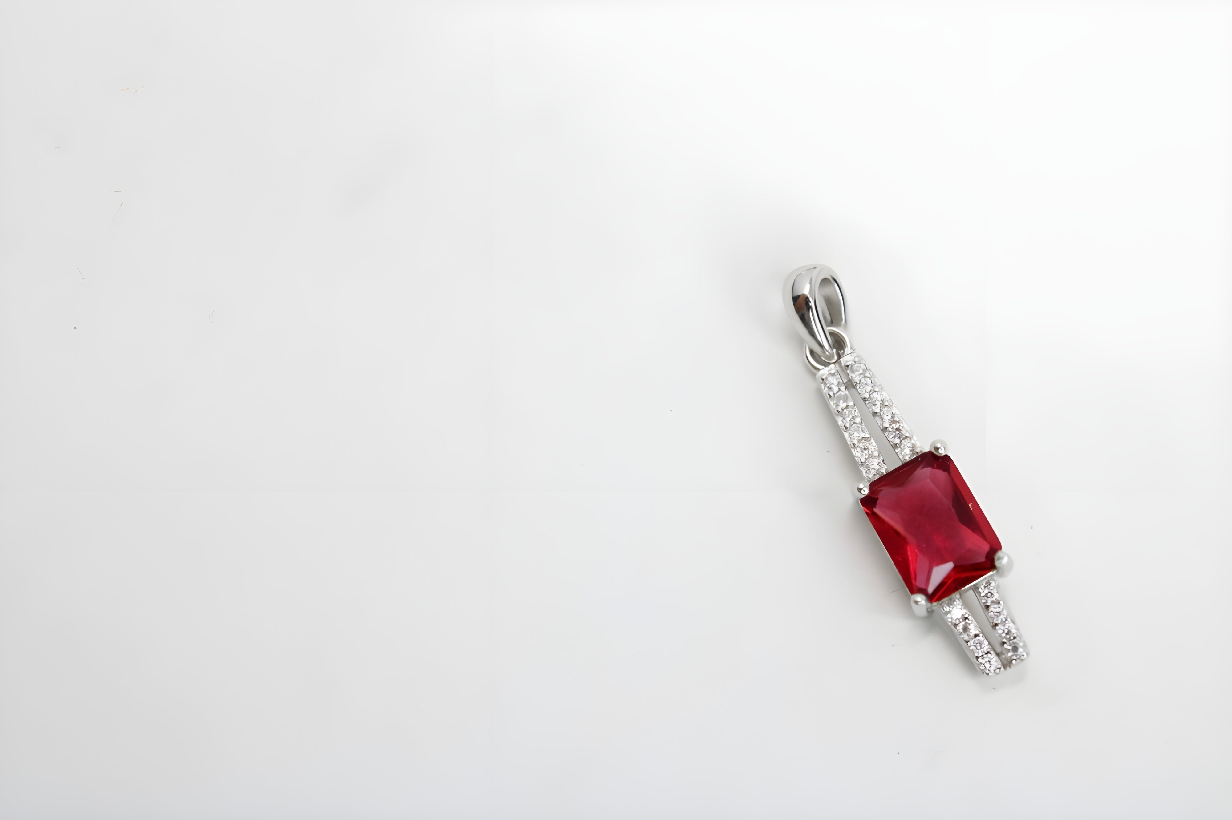 Ruby Radiance Diamond Jewelry Set - Sterling Silver Ring, Pendant & Drop Earrings with Rectangular-Cut Rubies and White Diamond Accents