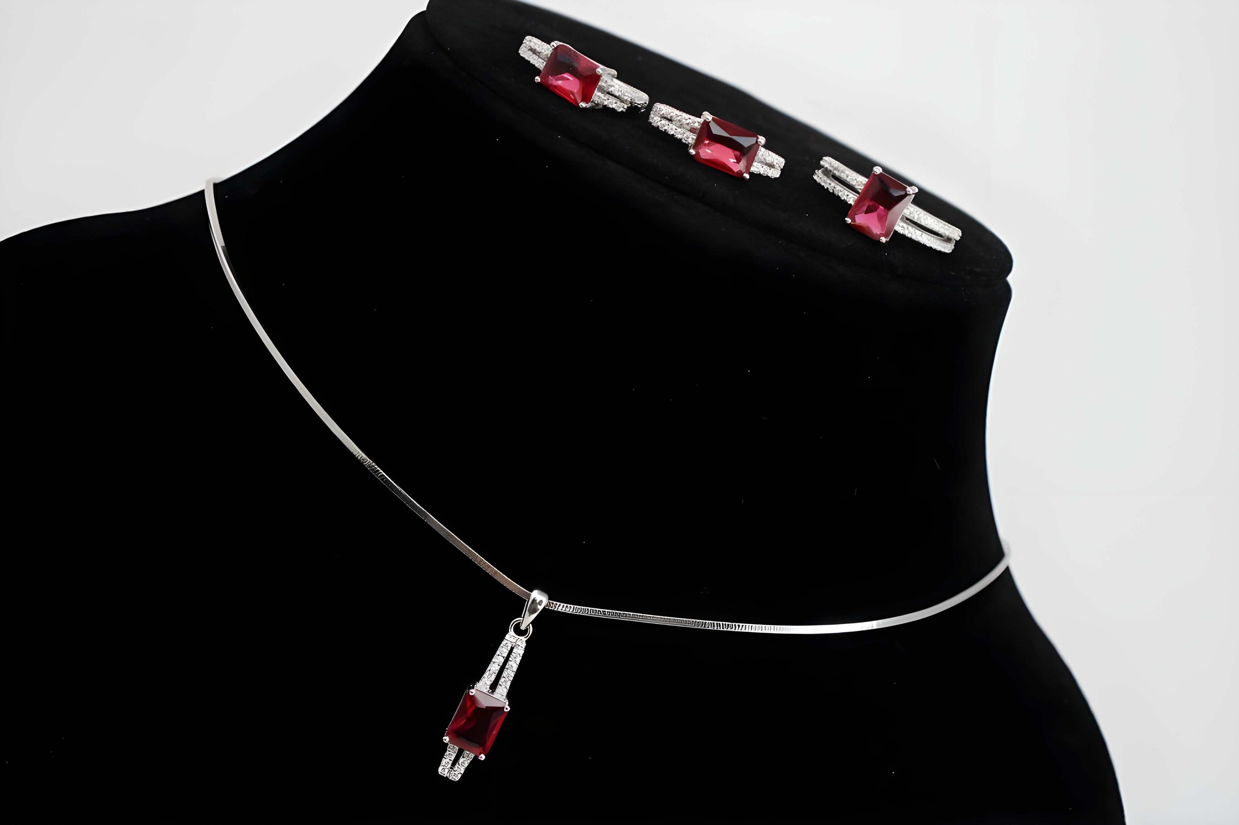 Ruby Radiance Diamond Jewelry Set - Sterling Silver Ring, Pendant & Drop Earrings with Rectangular-Cut Rubies and White Diamond Accents