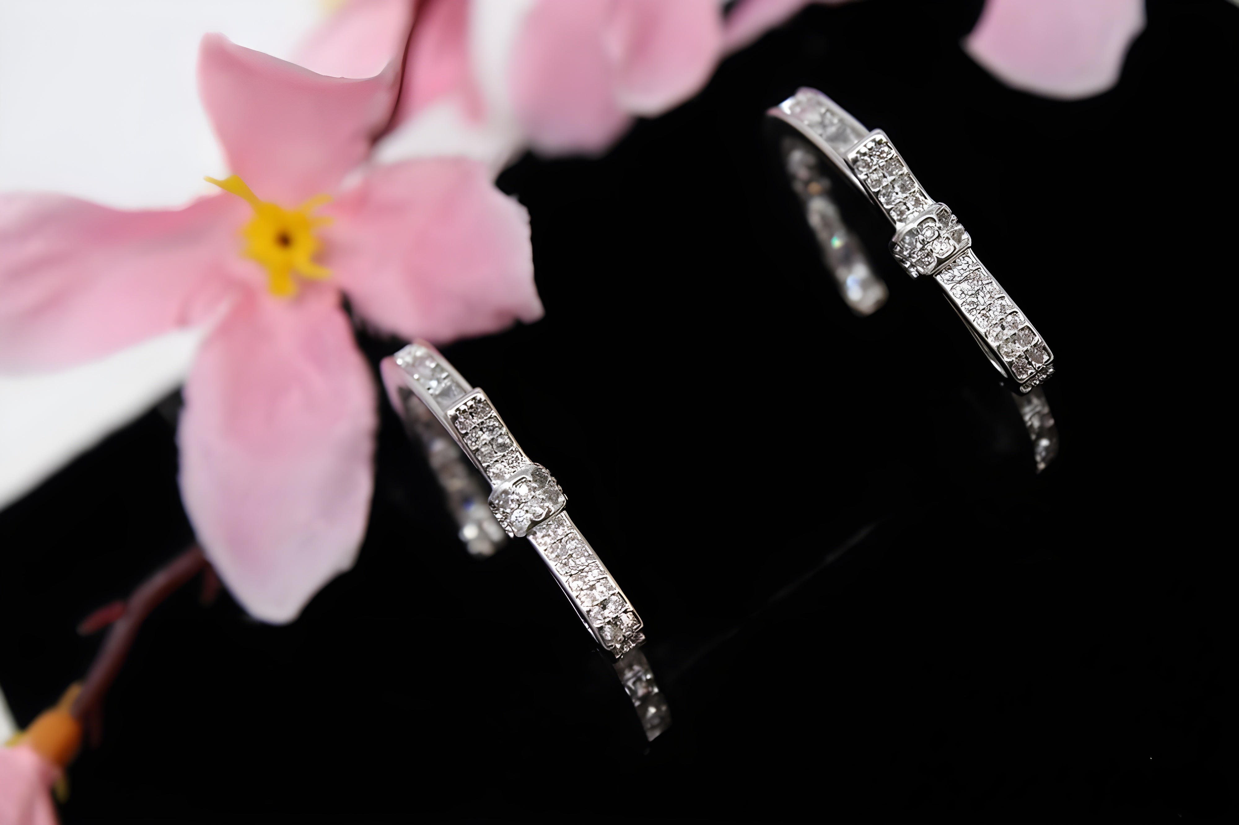 Twinkle Bow Silver Hoop Earrings