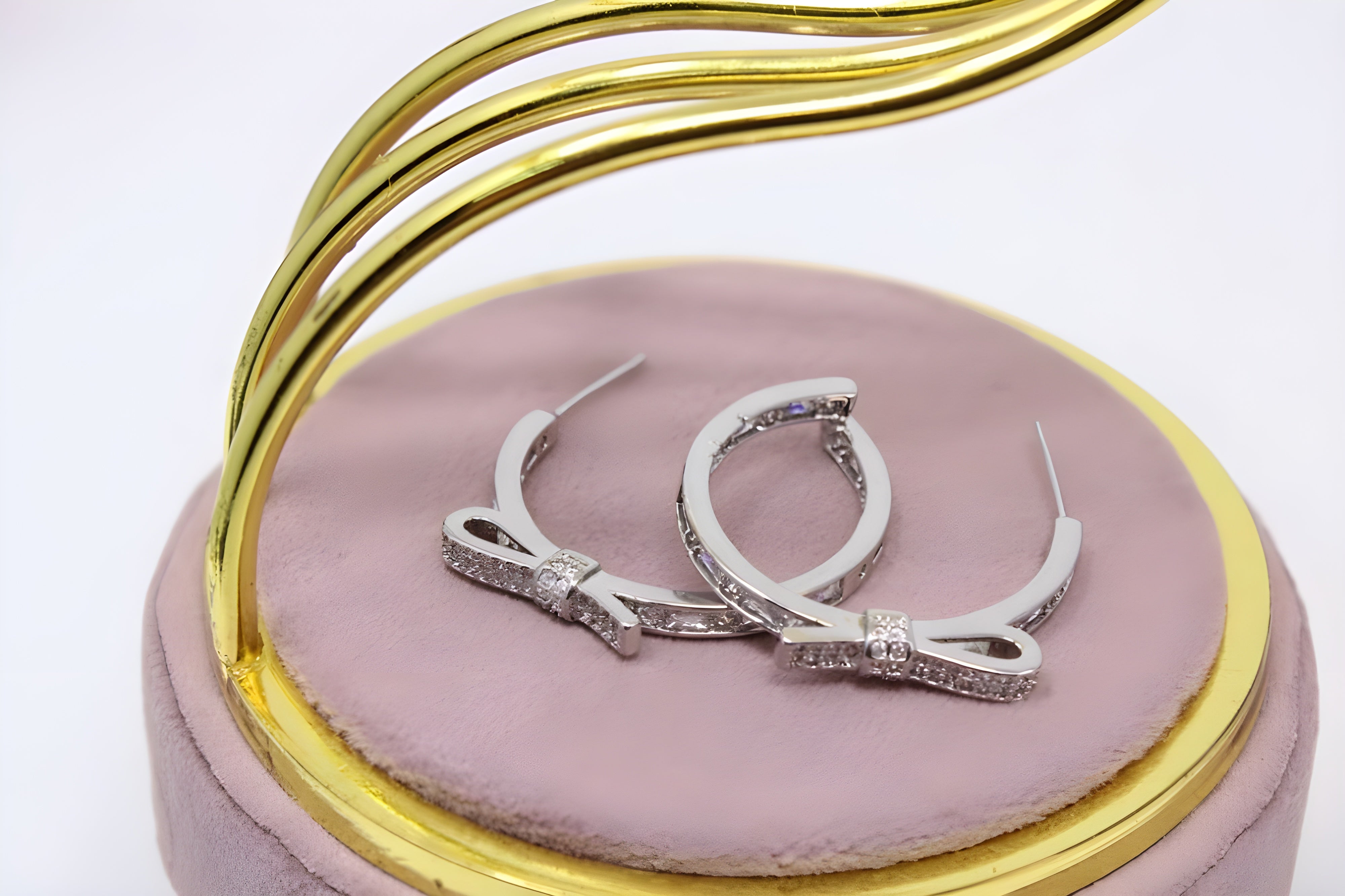 Twinkle Bow Silver Hoop Earrings