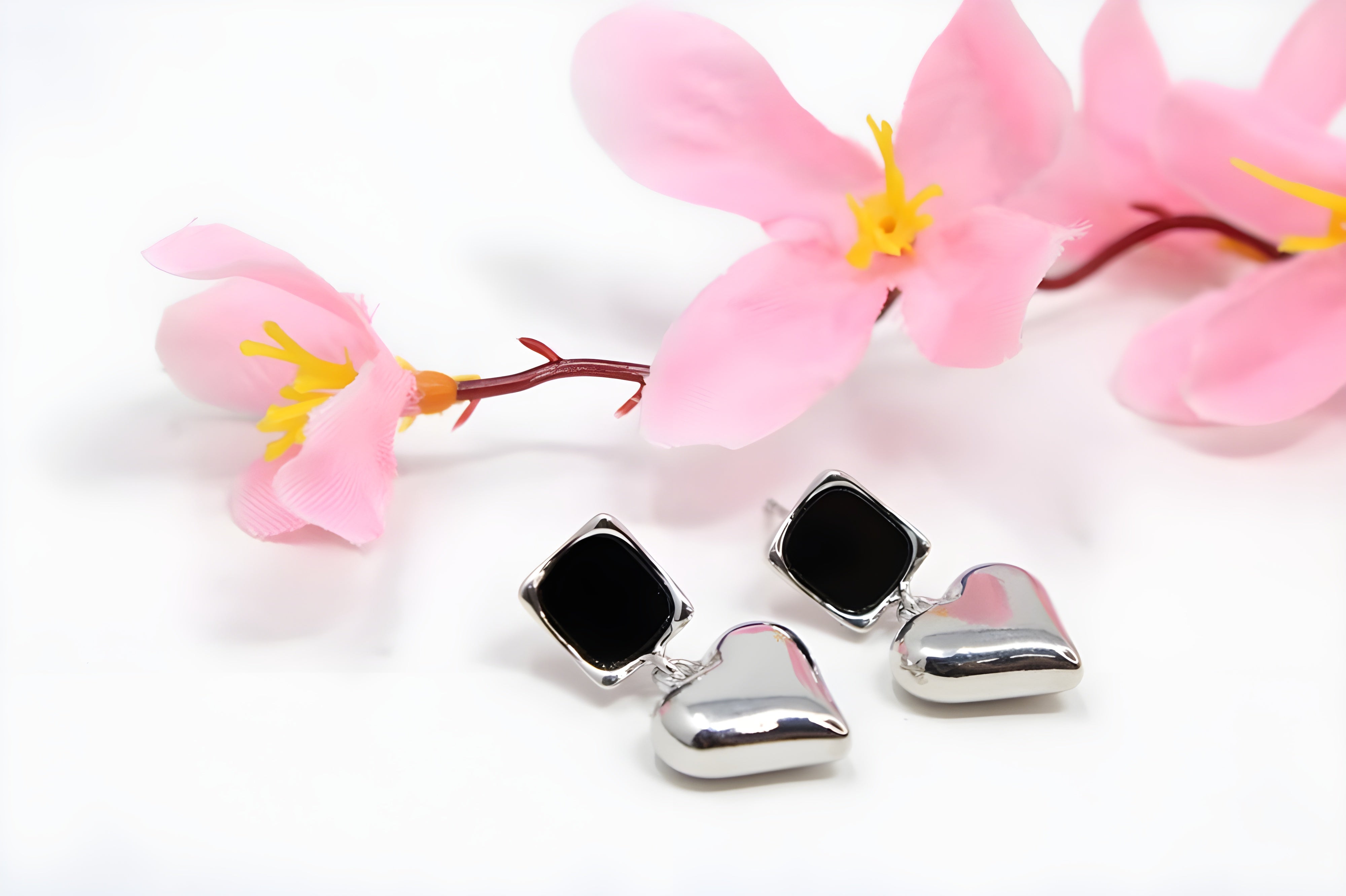 Enchanting Love Silver Heart Earrings with Black Center Square