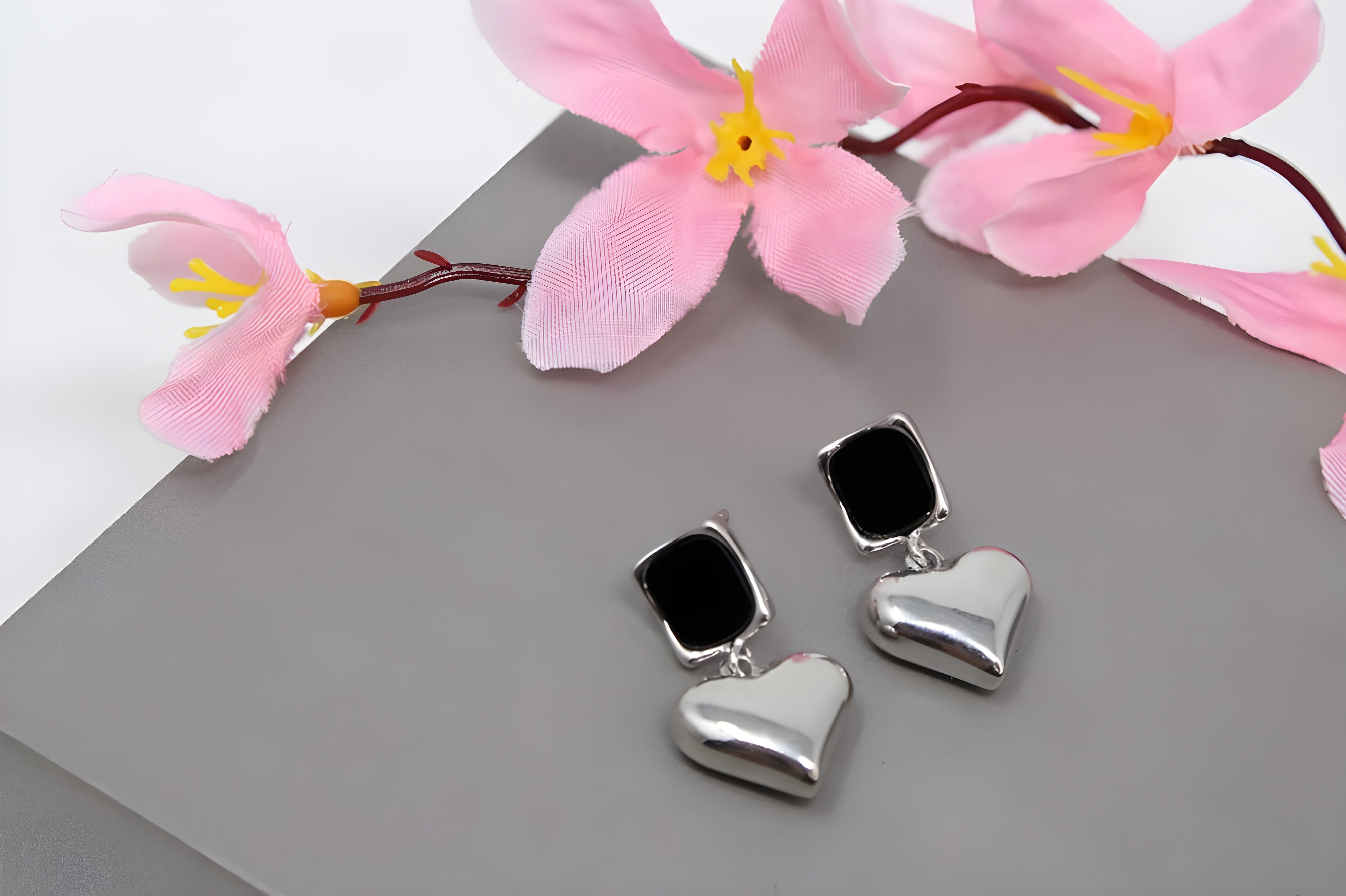 Enchanting Love Silver Heart Earrings with Black Center Square