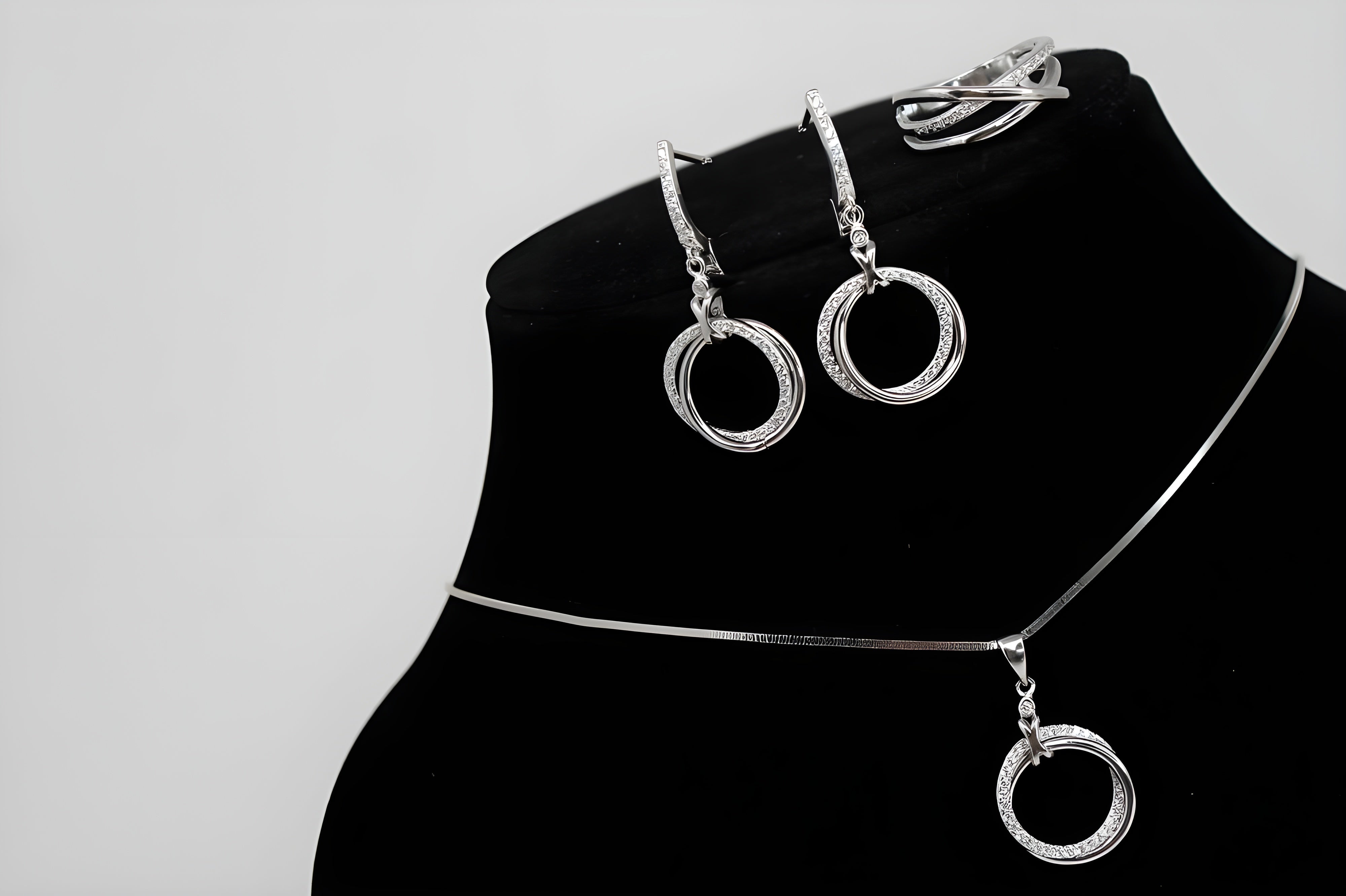 Eternal Circles Diamond Jewelry Set - Sterling Silver Ring, Pendant & Drop Earrings with Interlocking Circle Design and Sparkling White Diamonds