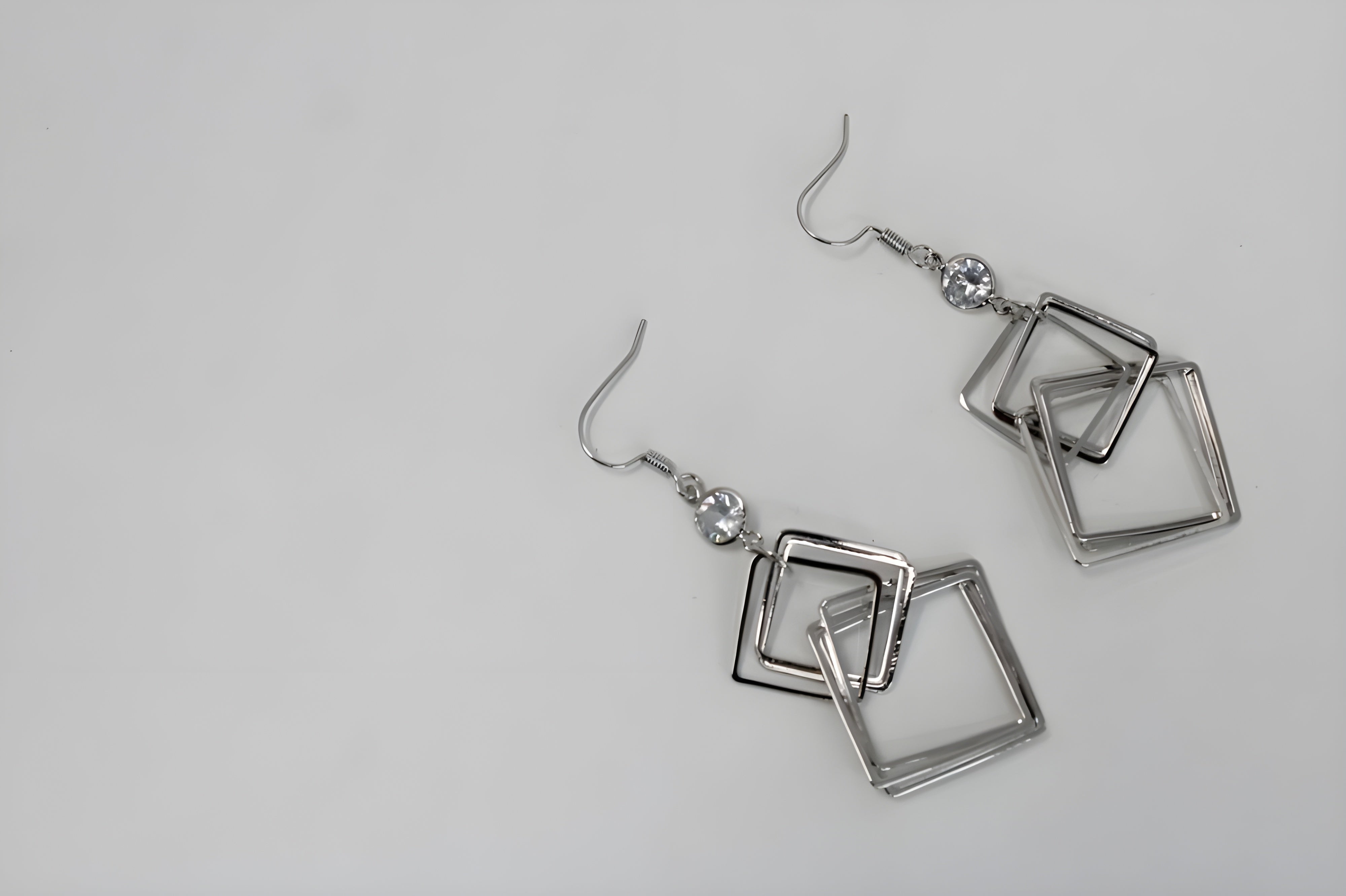 Radiant Geometry: Silver Square Drop Earrings