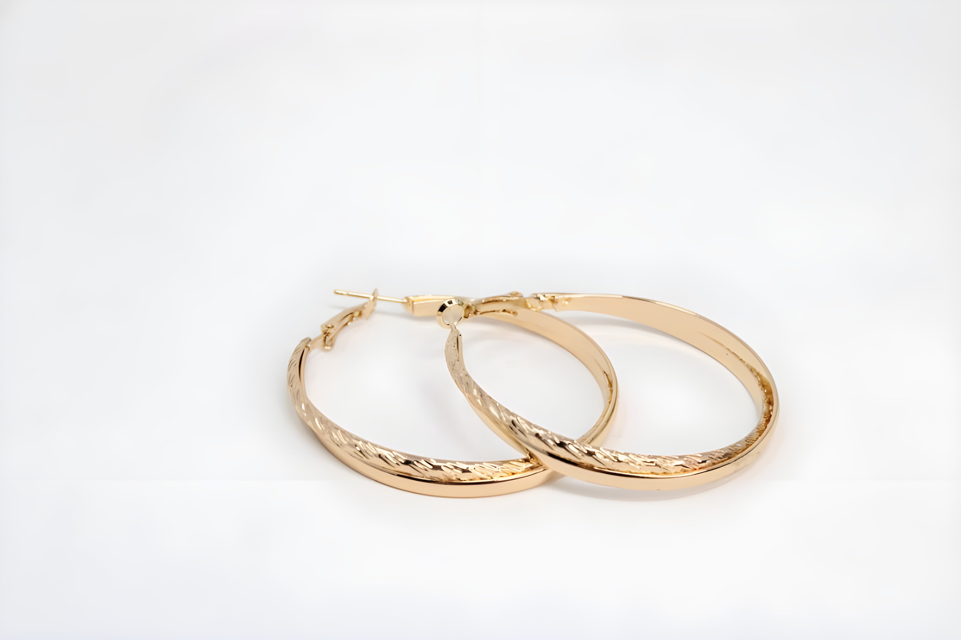 Intertwined Elegance Gold Hoop Earrings