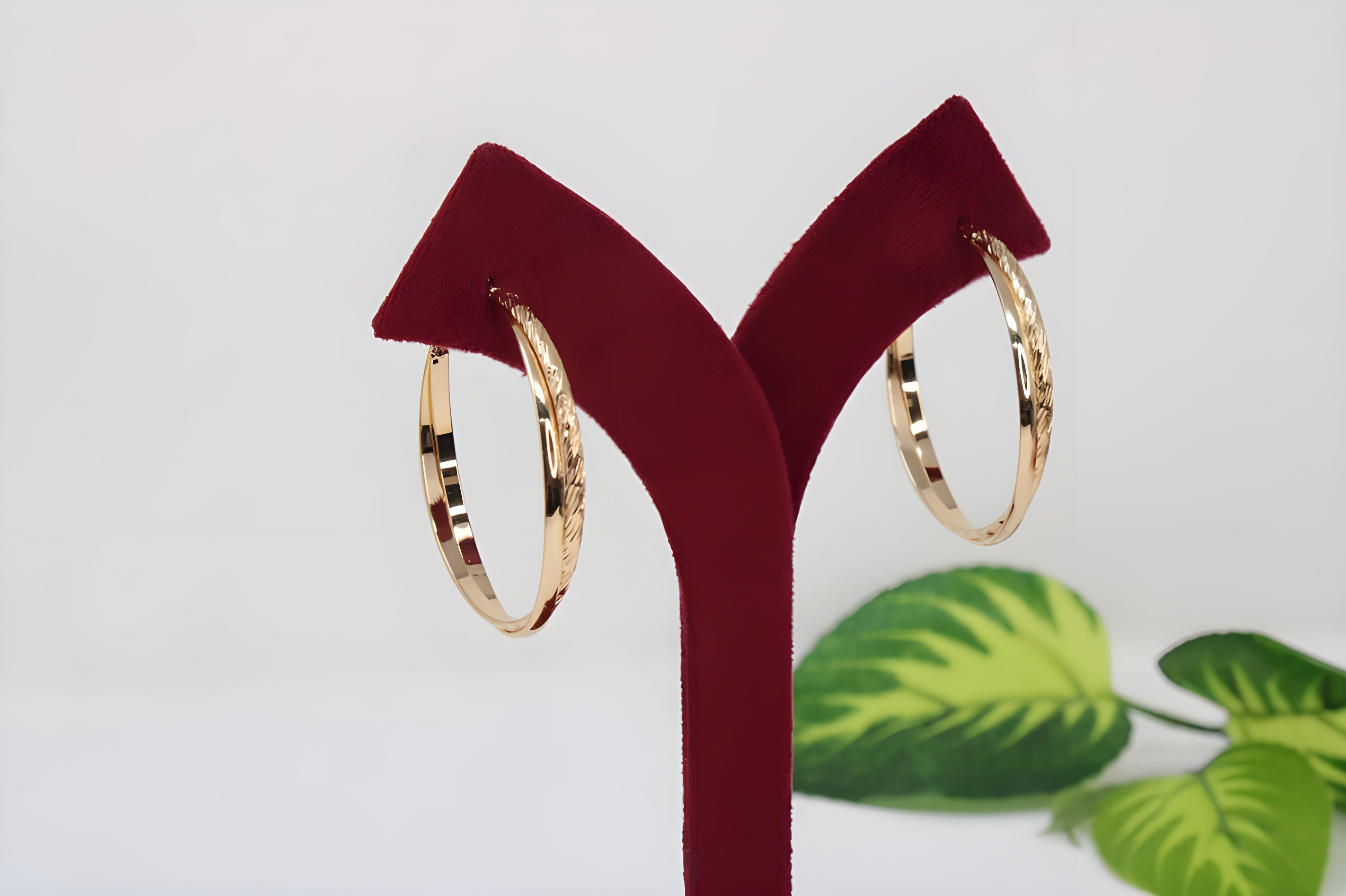 Intertwined Elegance Gold Hoop Earrings