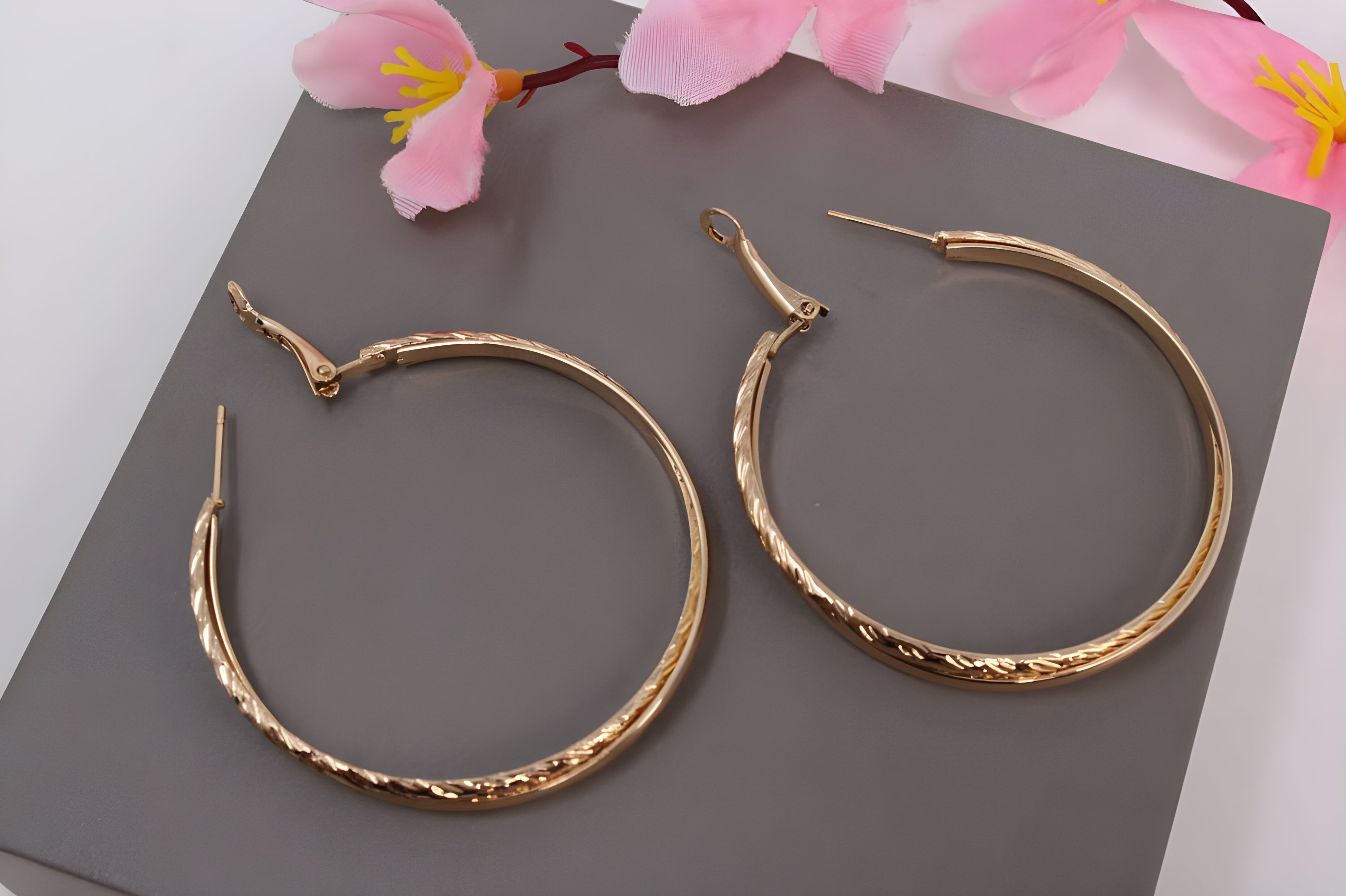 Intertwined Elegance Gold Hoop Earrings