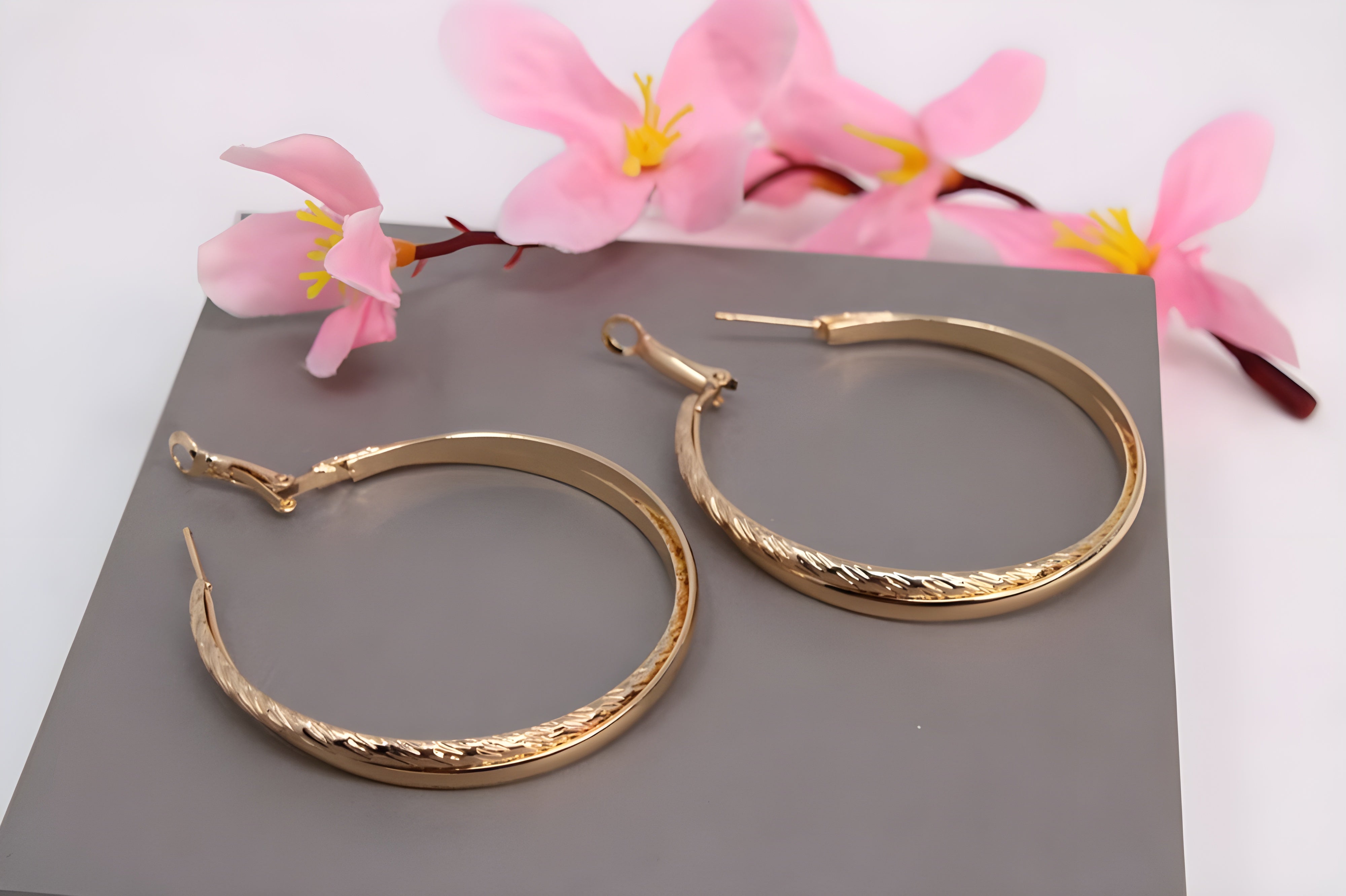 Intertwined Elegance Gold Hoop Earrings