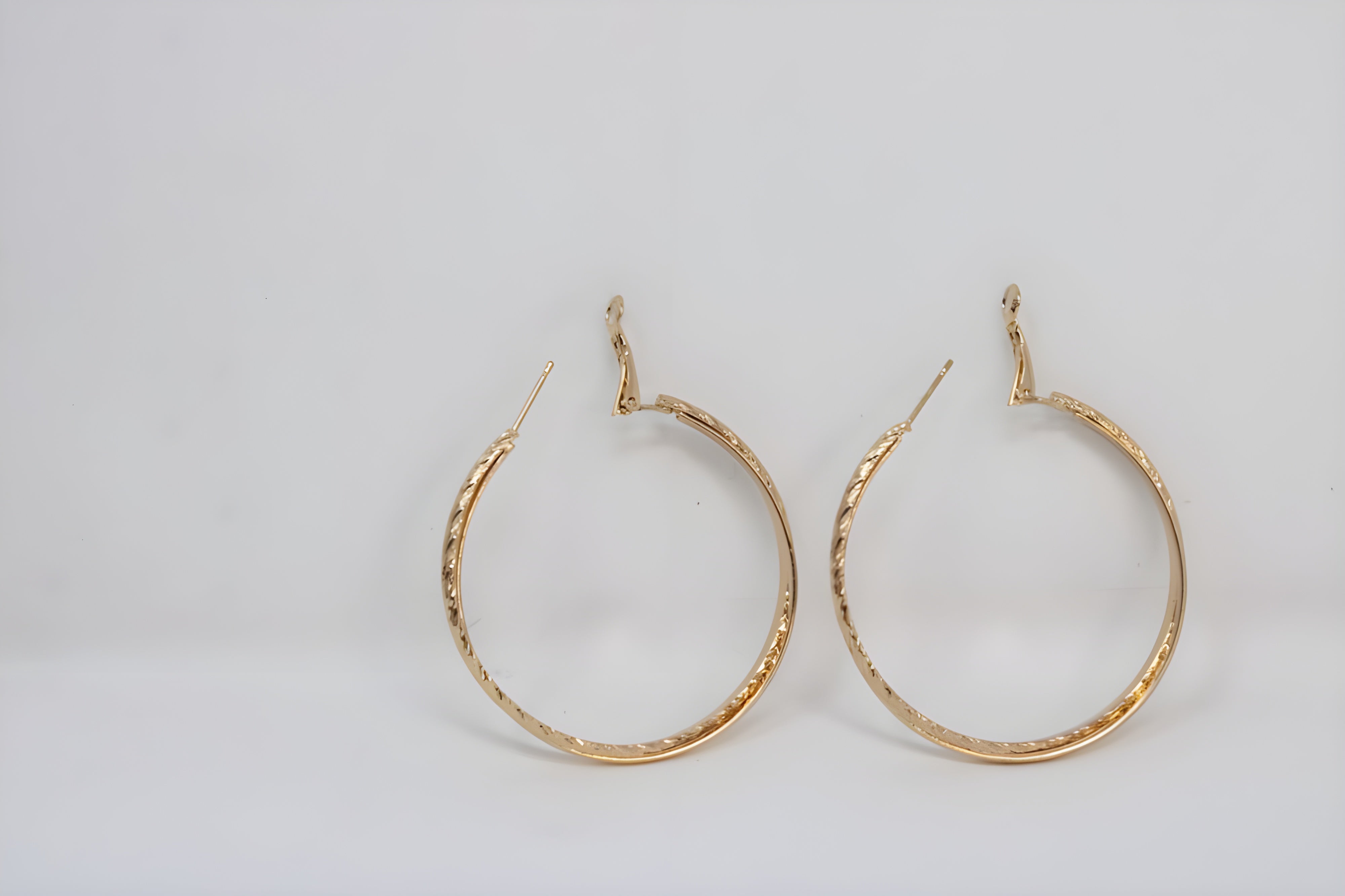 Intertwined Elegance Gold Hoop Earrings