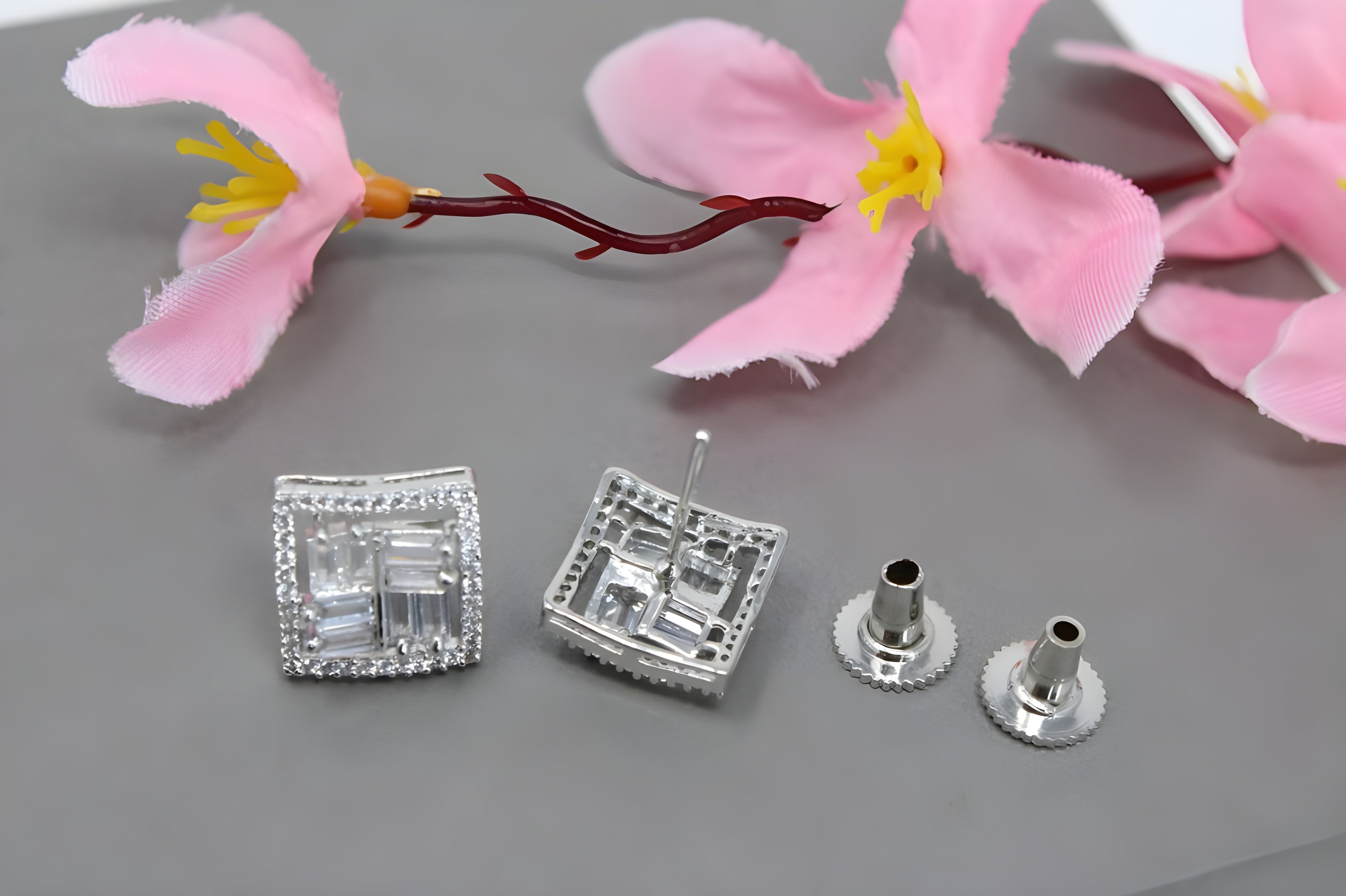 Brilliant Emerald Cut Diamond Stud Earrings